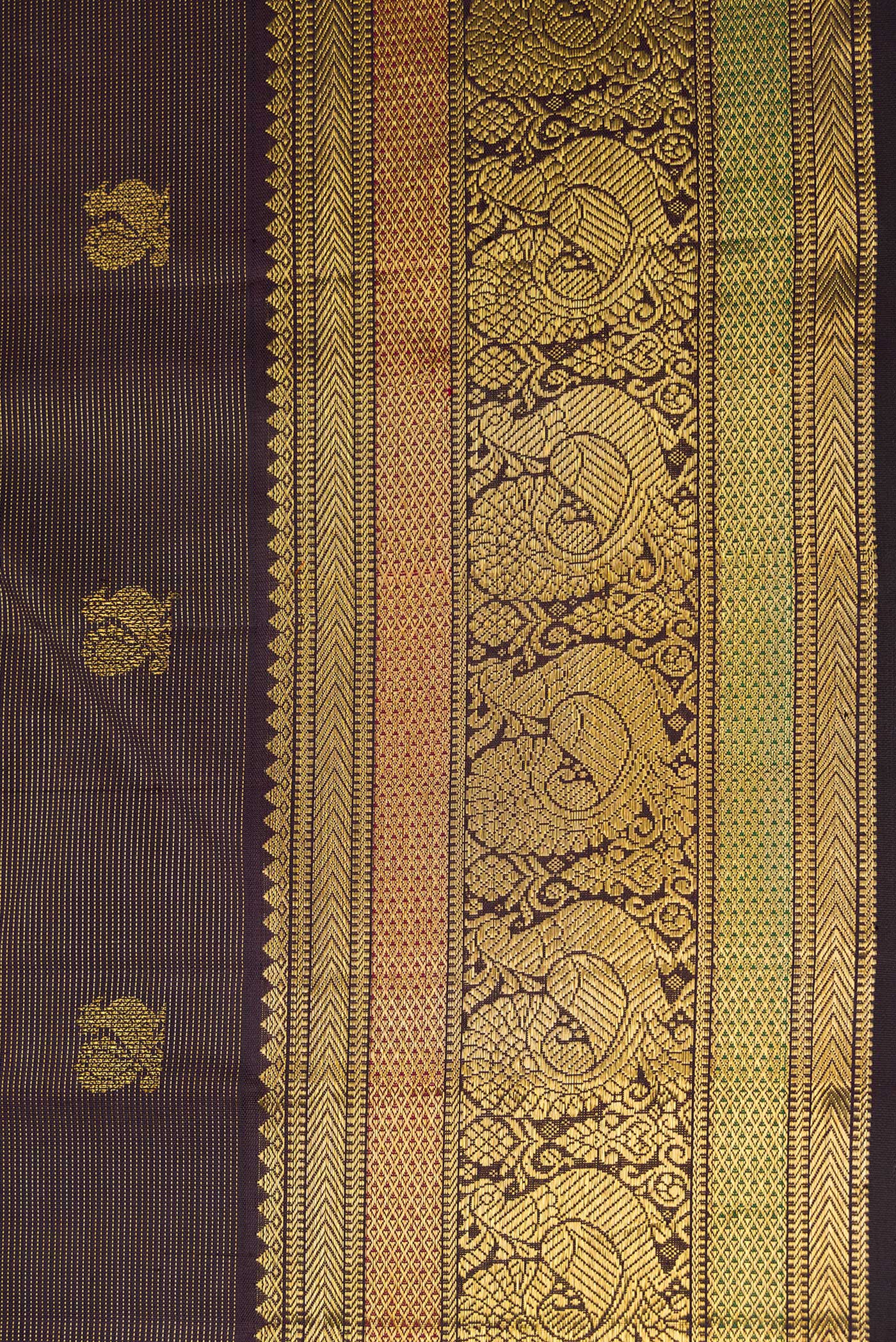 Border image of Pure Silk Pure Zari Brown Dual Tone Kanchipuram Saree with Zari Butta on the body and Zari Border. 