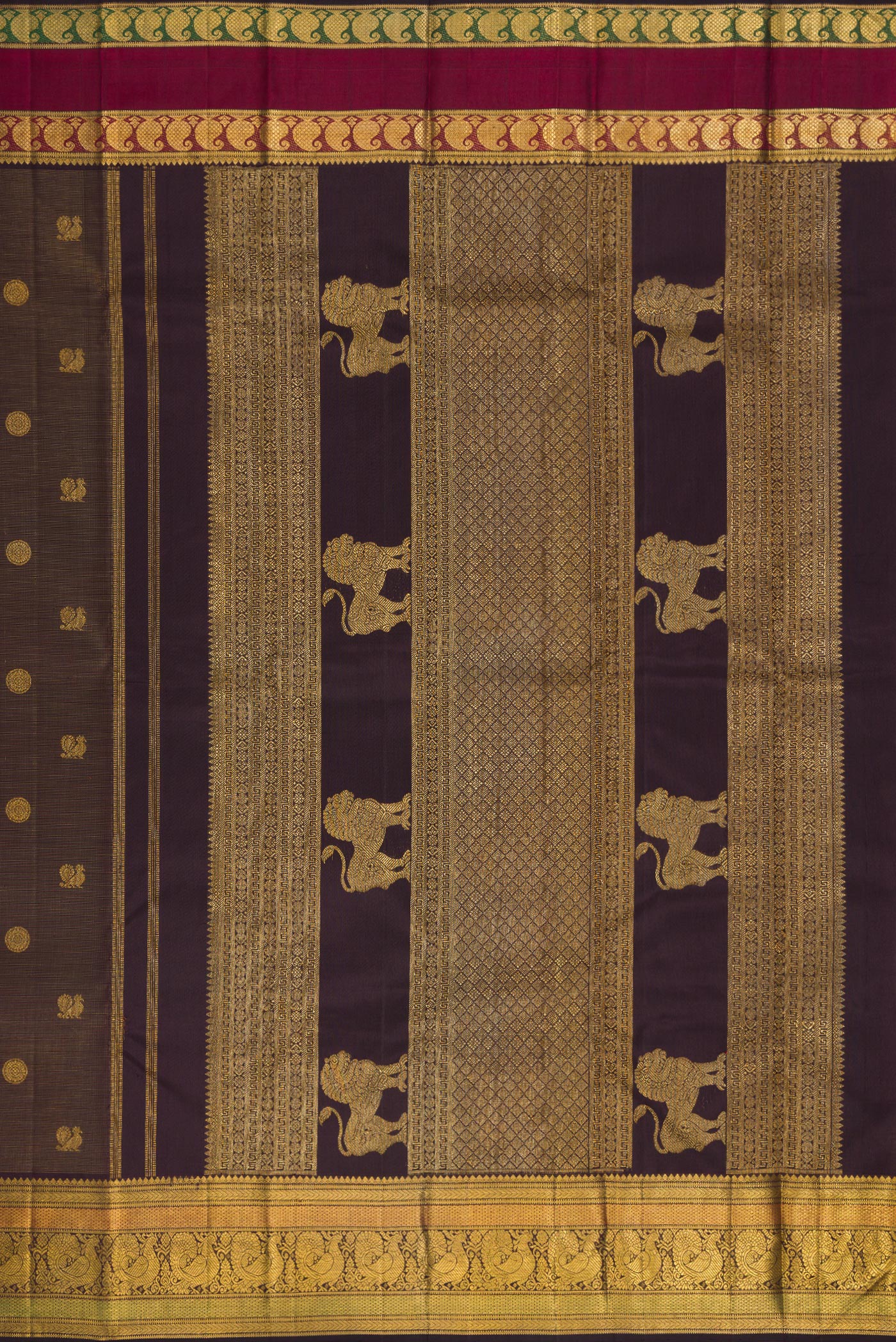 Close up image of the pallu of Pure Silk Pure Zari Brown Dual Tone Kanchipuram Saree with Zari Butta on the body and Zari Border. 