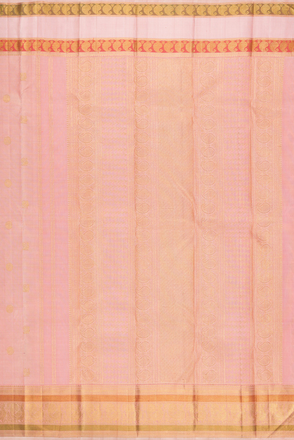 Close up image of the pallu of Peach Kanchipuram Silk Saree with Zari Butta on the body and Zari And Thread Border. 