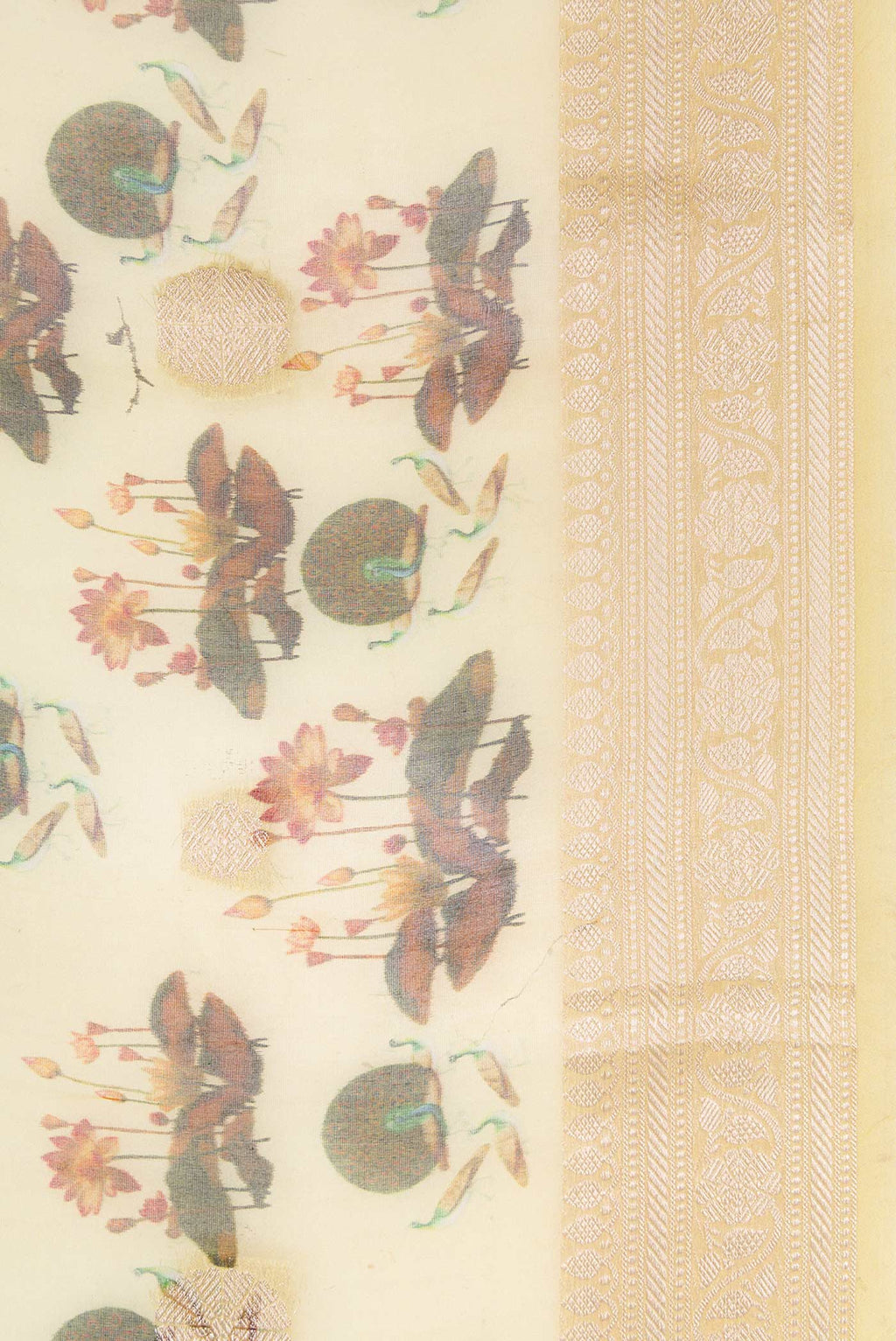 Border image of Green Dual Tone Organza Silk Saree with Printed design on the body and Zari Border. 