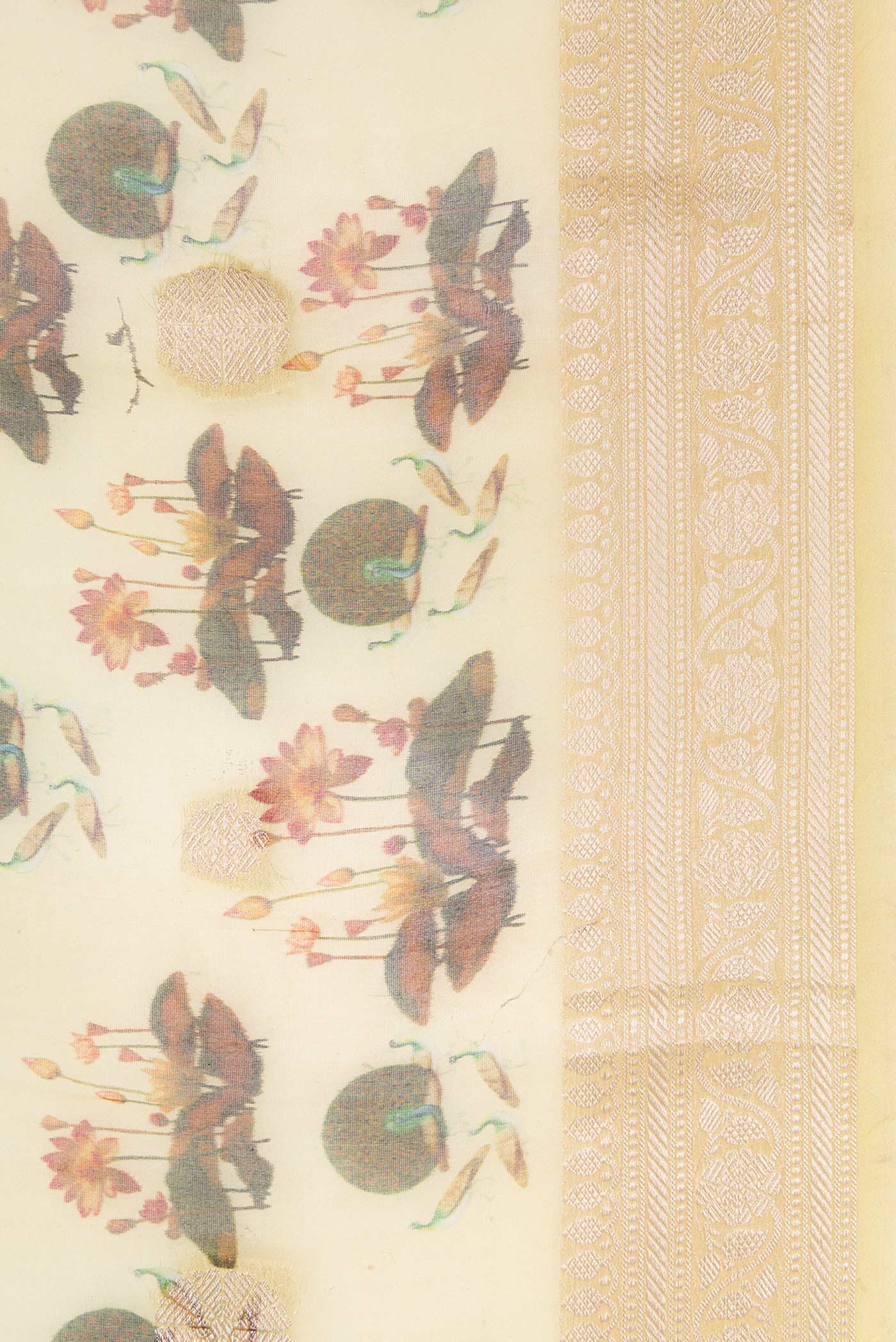 Border image of Green Dual Tone Organza Silk Saree with Printed design on the body and Zari Border. 