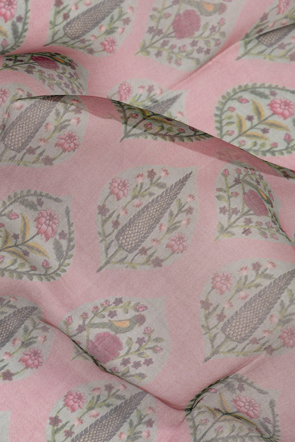 Close up of Mauve Organza Silk Saree with Printed design on the body and Zari Border.  displaying folds