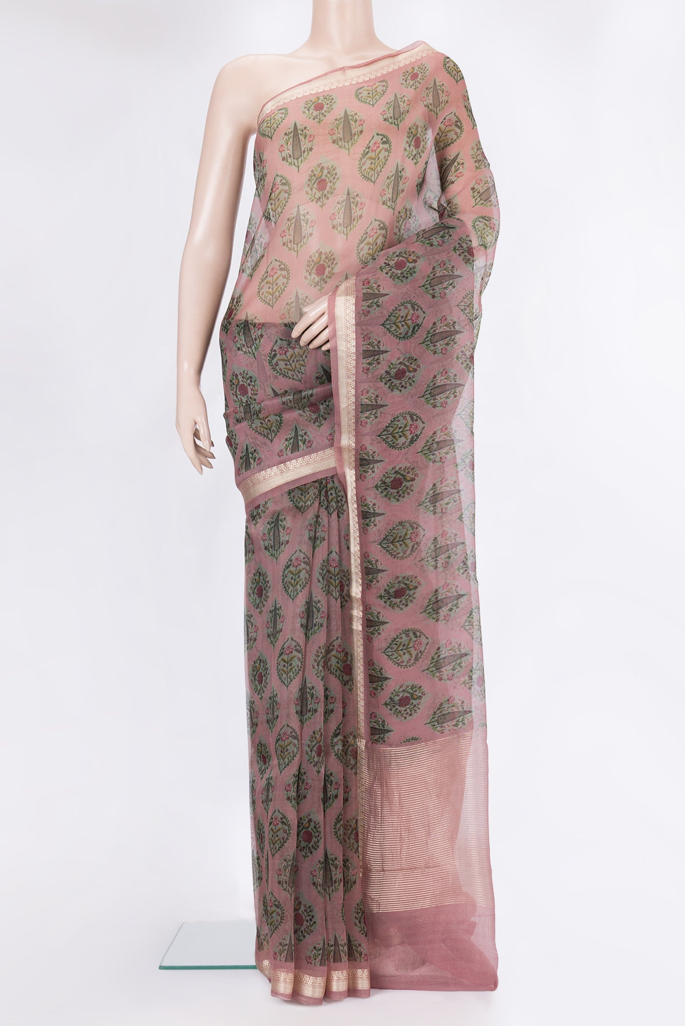 Mauve Organza Silk Saree with Printed design on the body and Zari Border.  displayed on a mannequin