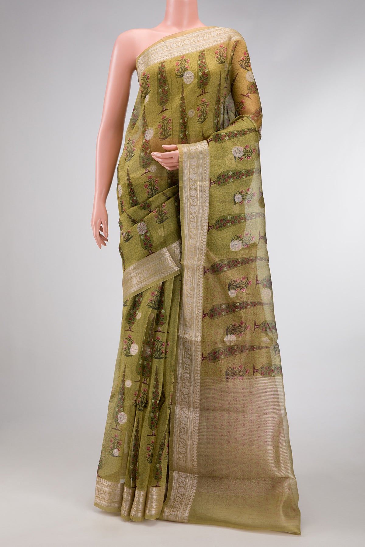 Pista Green Dual Tone Organza Silk Saree with Printed design on the body and Zari Border.  displayed on a mannequin