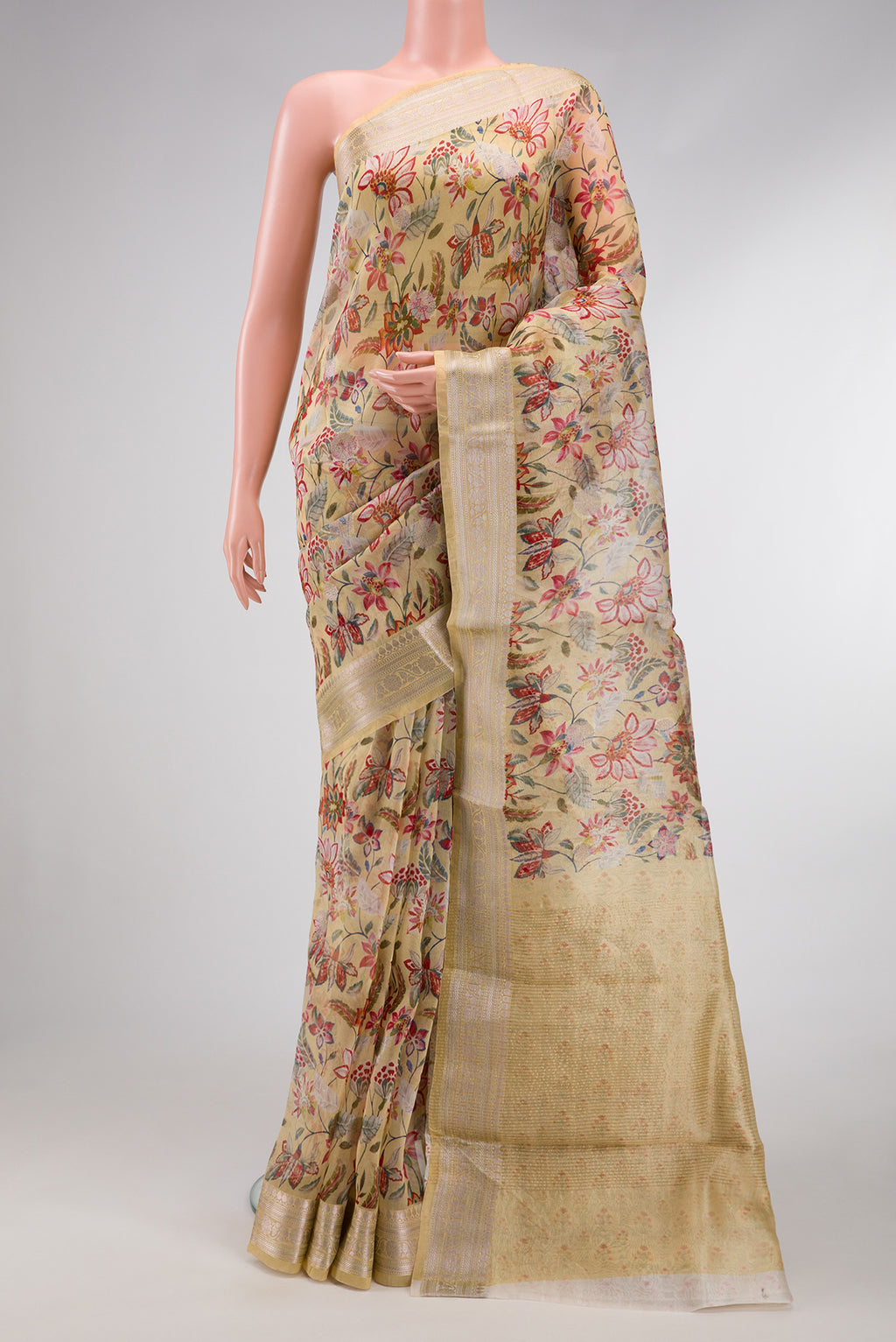 Sandal Dual Tone Organza Silk Saree with Printed design on the body and Zari Border.  displayed on a mannequin