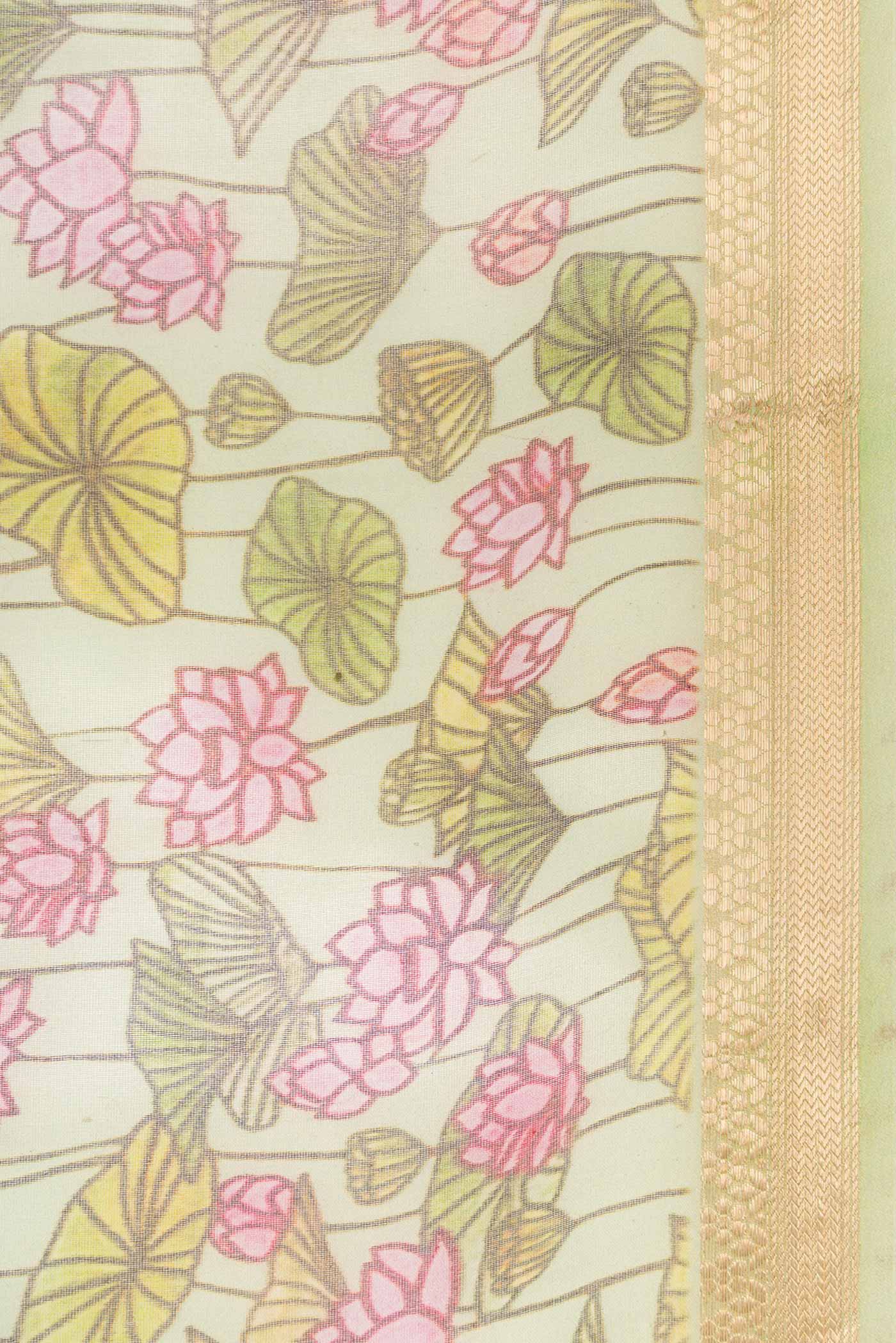 Border image of Pista Green Dual Tone Organza Silk Saree with Printed design on the body and Zari Border. 