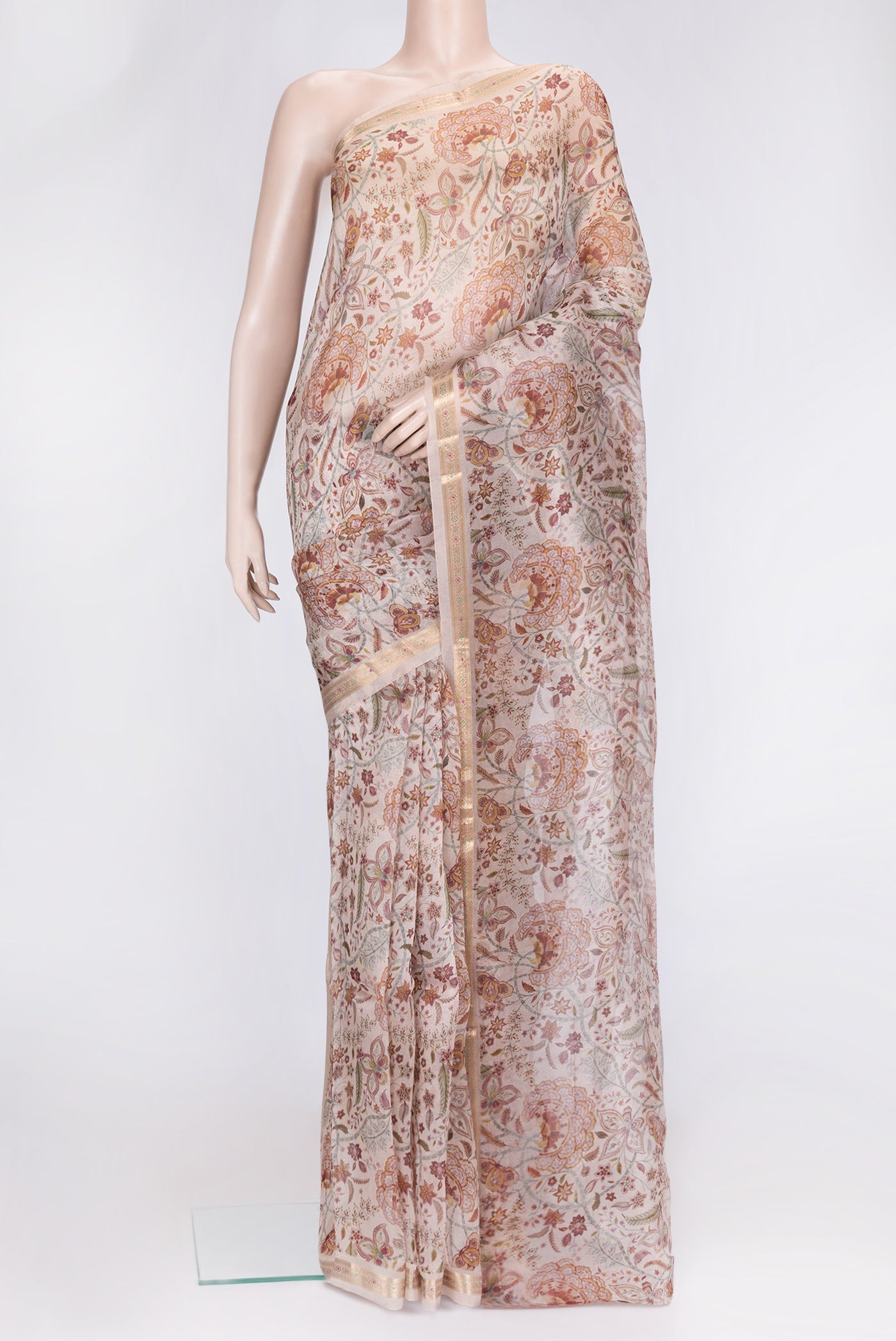 Beige Dual Tone Organza Silk Saree with Printed design on the body and Zari Border.  displayed on a mannequin