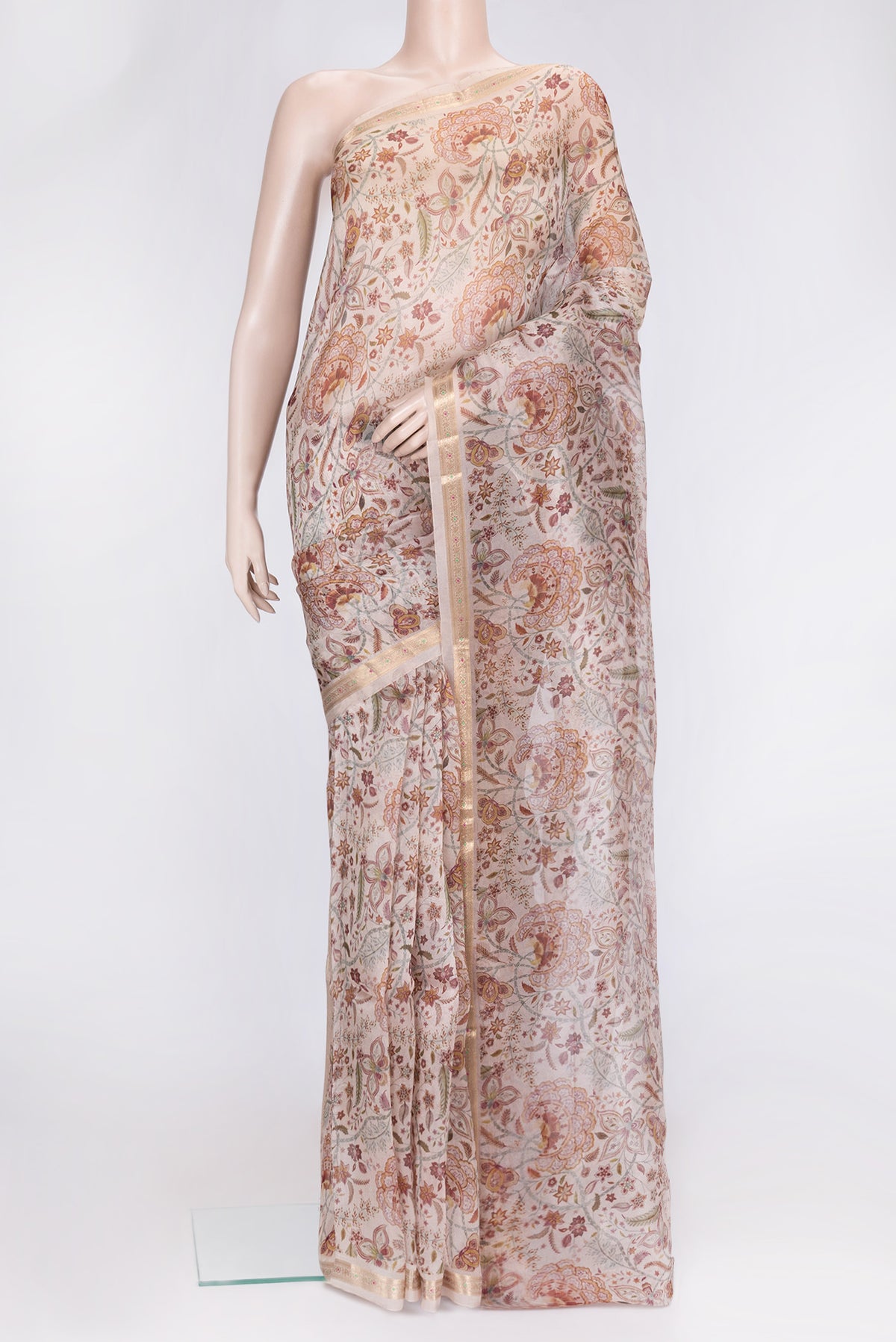 Beige Dual Tone Organza Silk Saree with Printed design on the body and Zari Border.  displayed on a mannequin