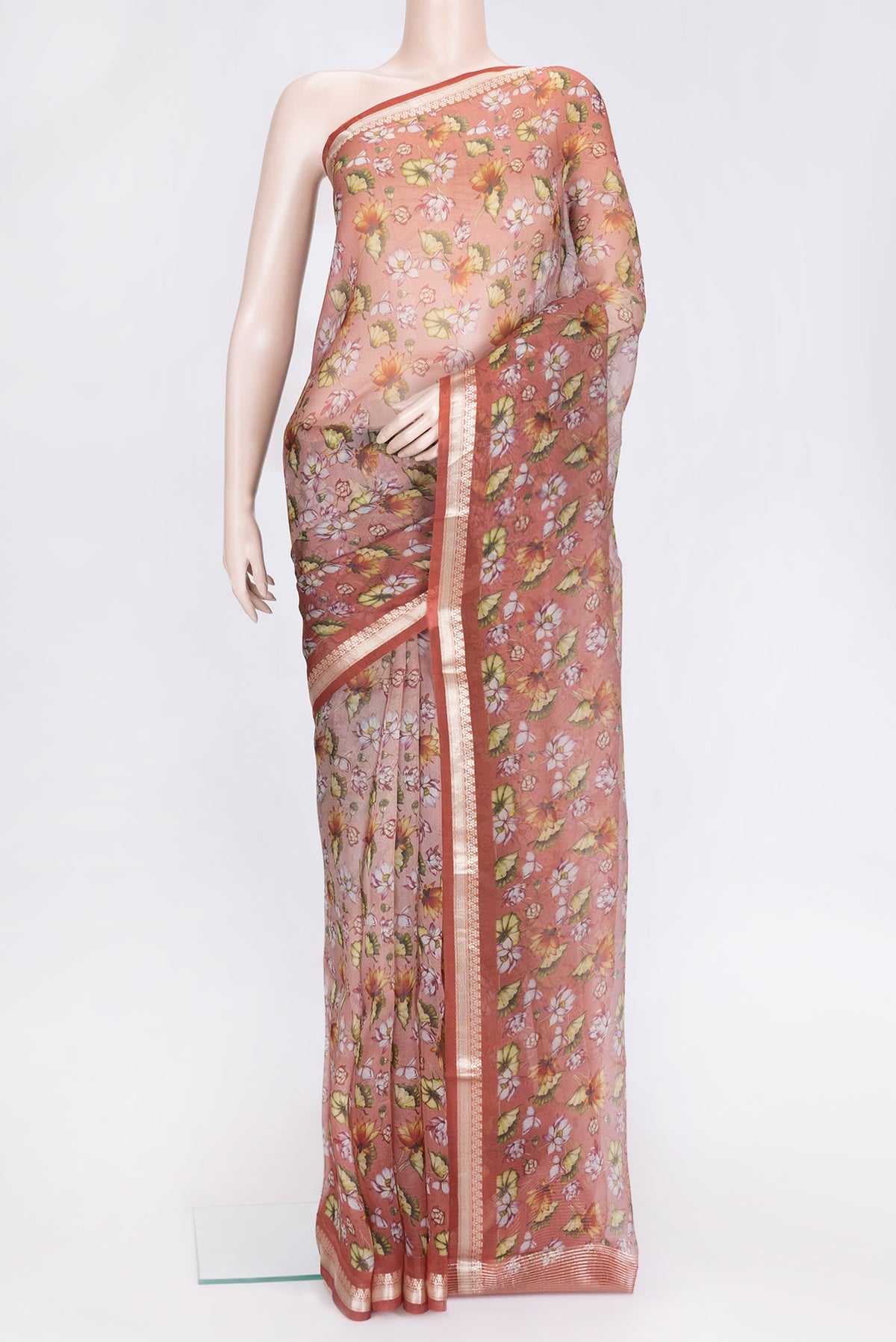 Orange Dual Tone Organza Silk Saree with Printed design on the body and Zari Border.  displayed on a mannequin