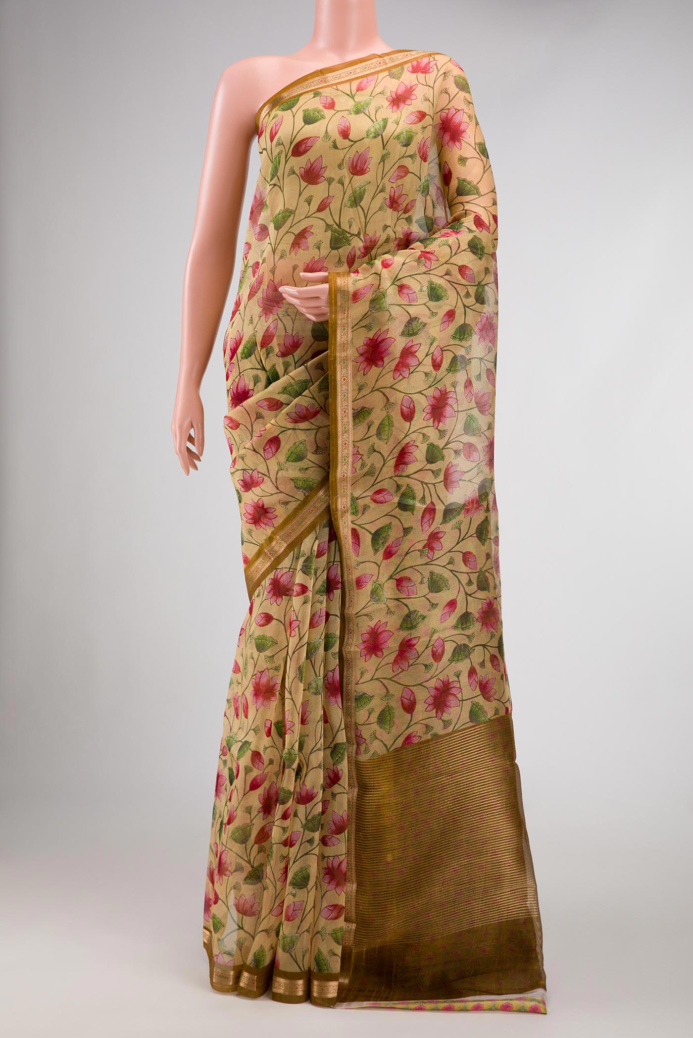 Sandal Dual Tone Organza Silk Saree with Printed design on the body and Zari Border.  displayed on a mannequin