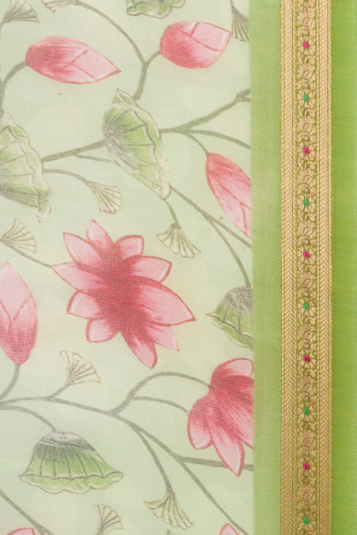Border image of Green Dual Tone Organza Silk Saree with Printed design on the body and Zari Border. 