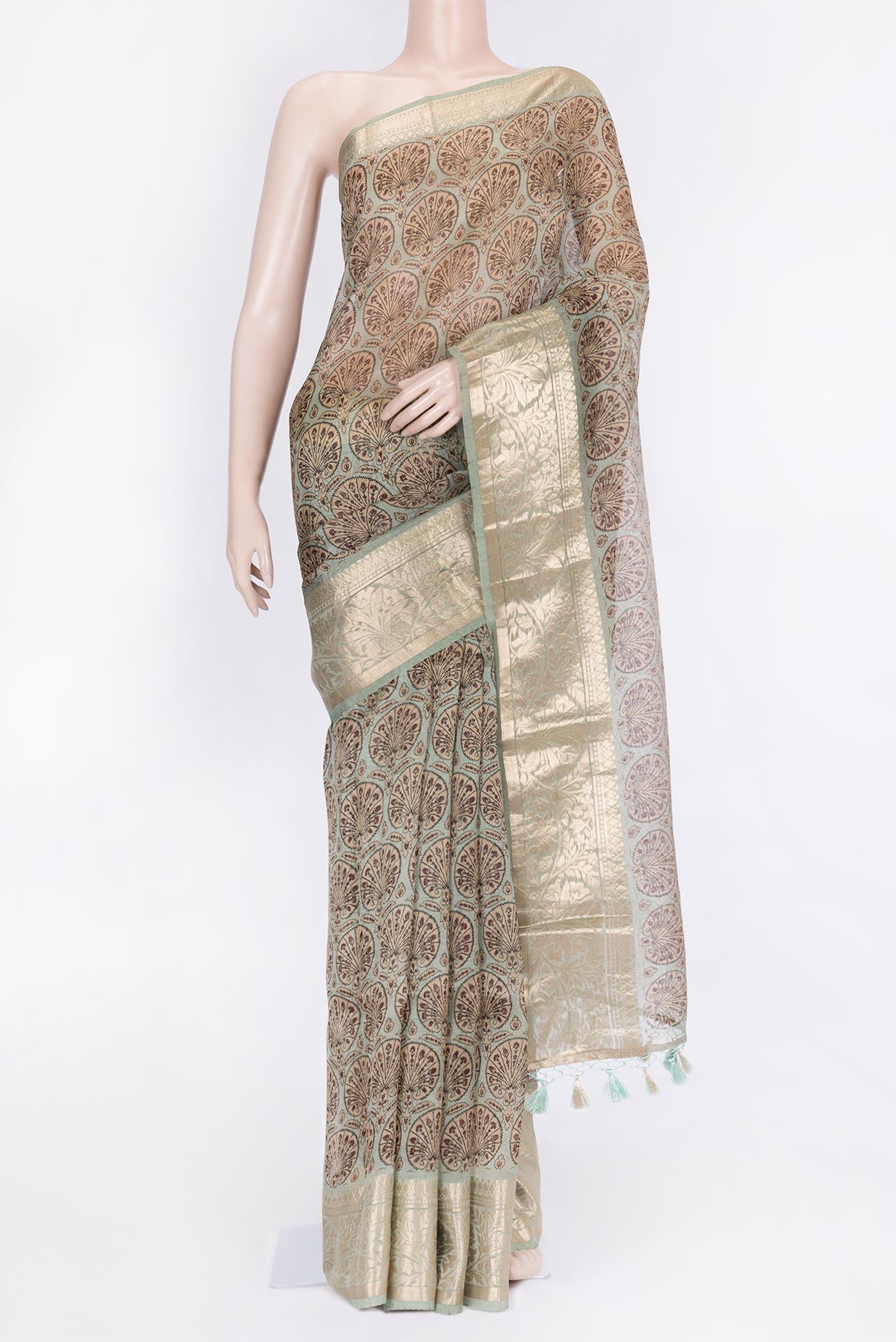 Beige Dual Tone Organza Silk Saree with Printed design on the body and Zari Border.  displayed on a mannequin