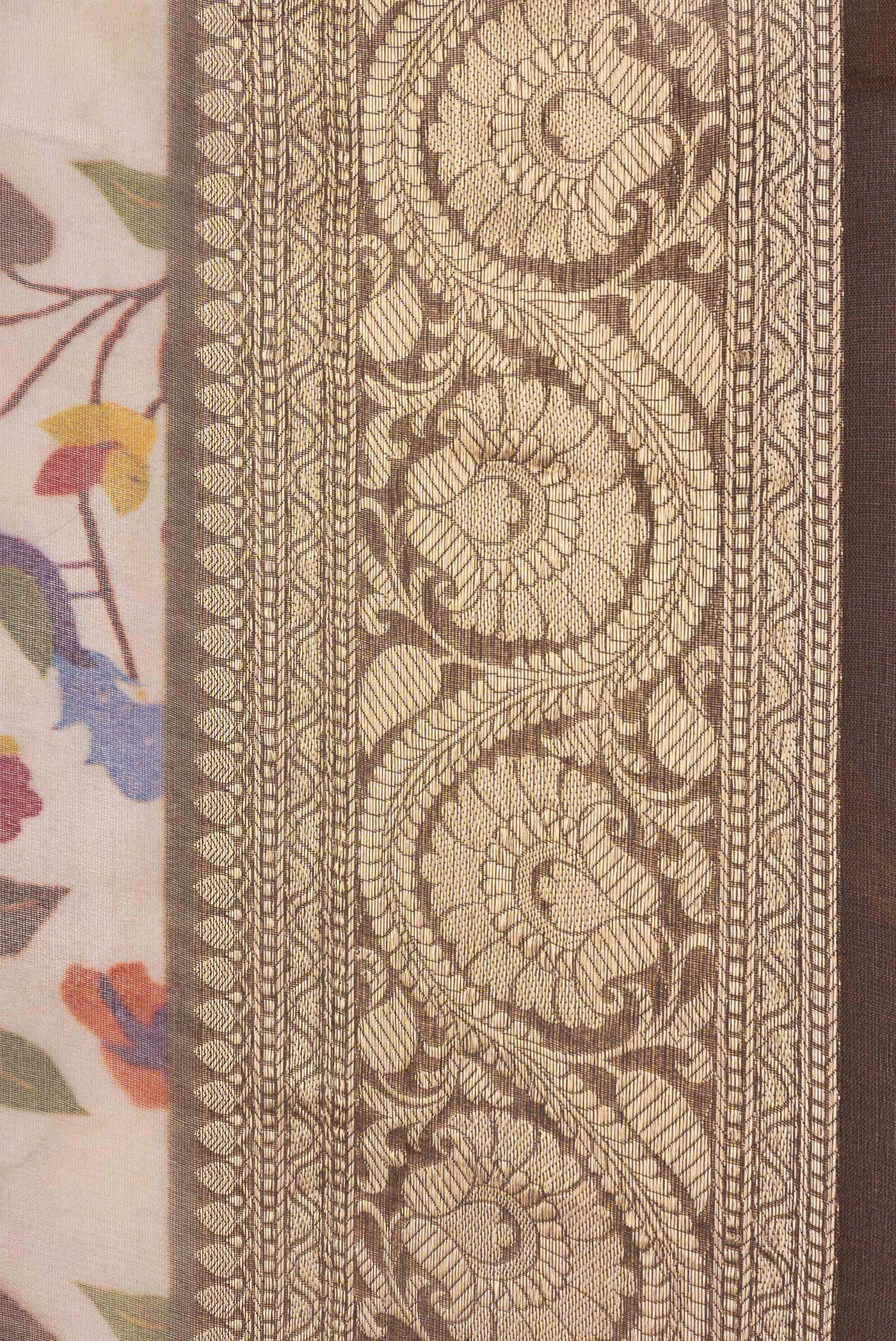 Border image of Rose Gold Dual Tone Organza Silk Saree with Printed design on the body and Zari Border. 