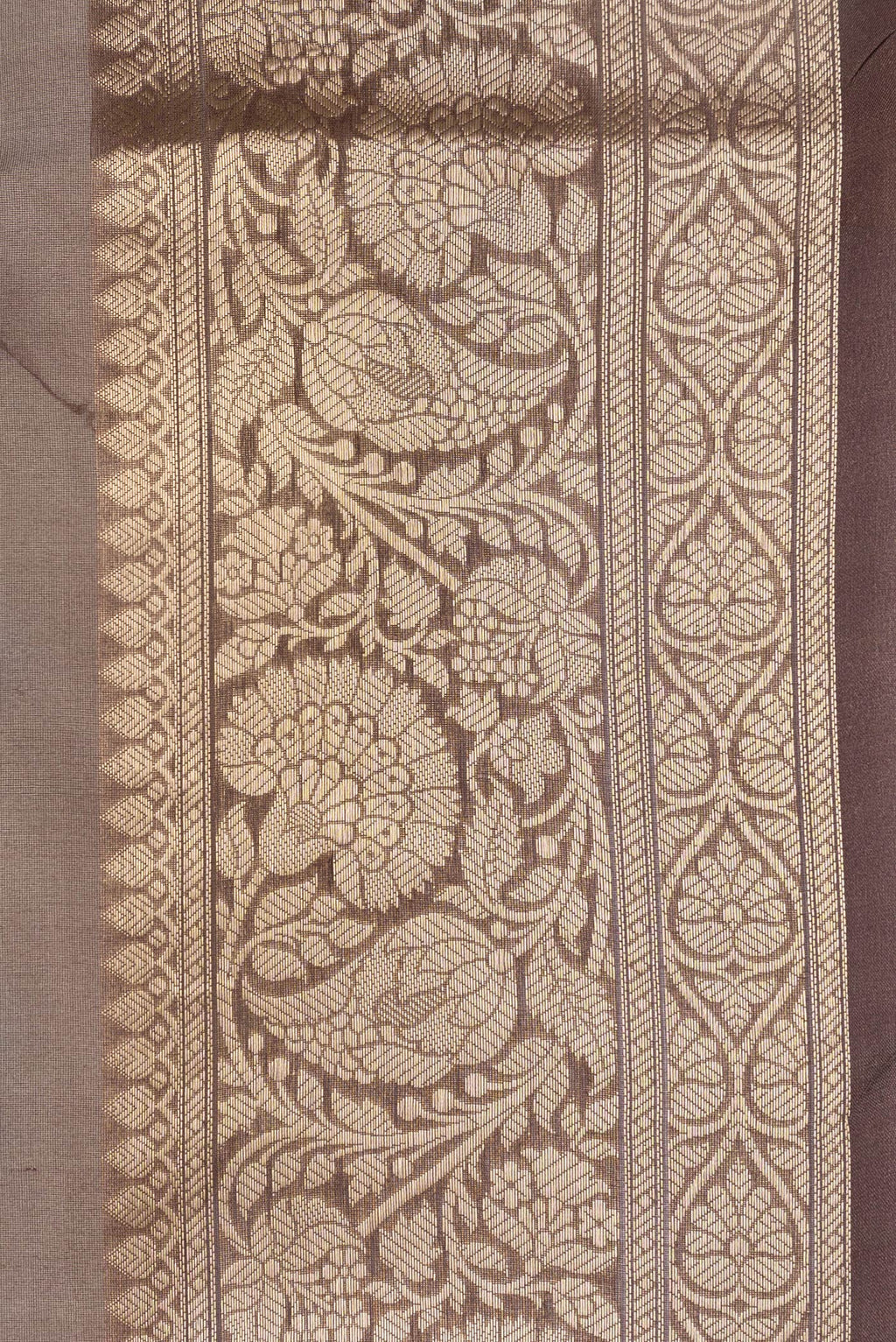 Border image of Brown Dual Tone Organza Silk Saree with Printed design on the body and Zari Border. 