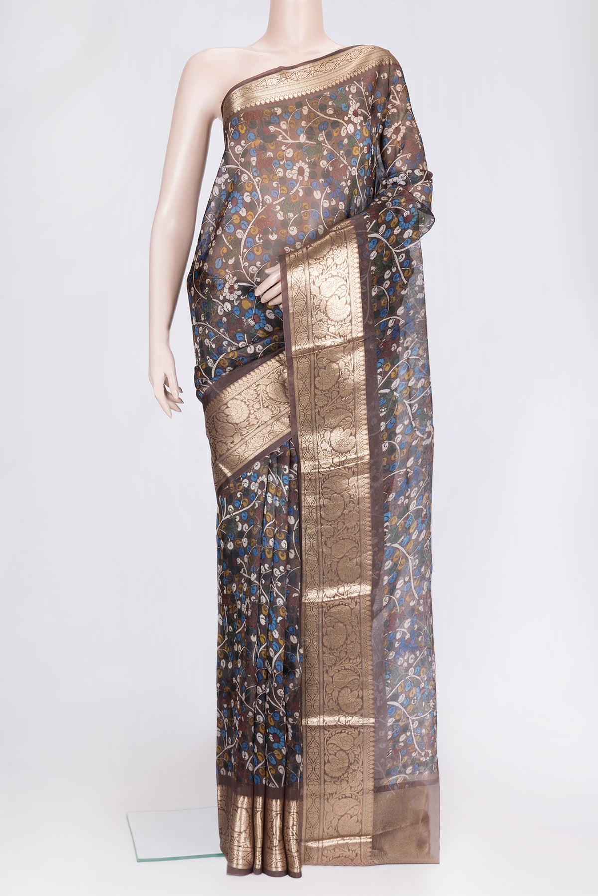 Brown Dual Tone Organza Silk Saree with Printed design on the body and Zari Border.  displayed on a mannequin