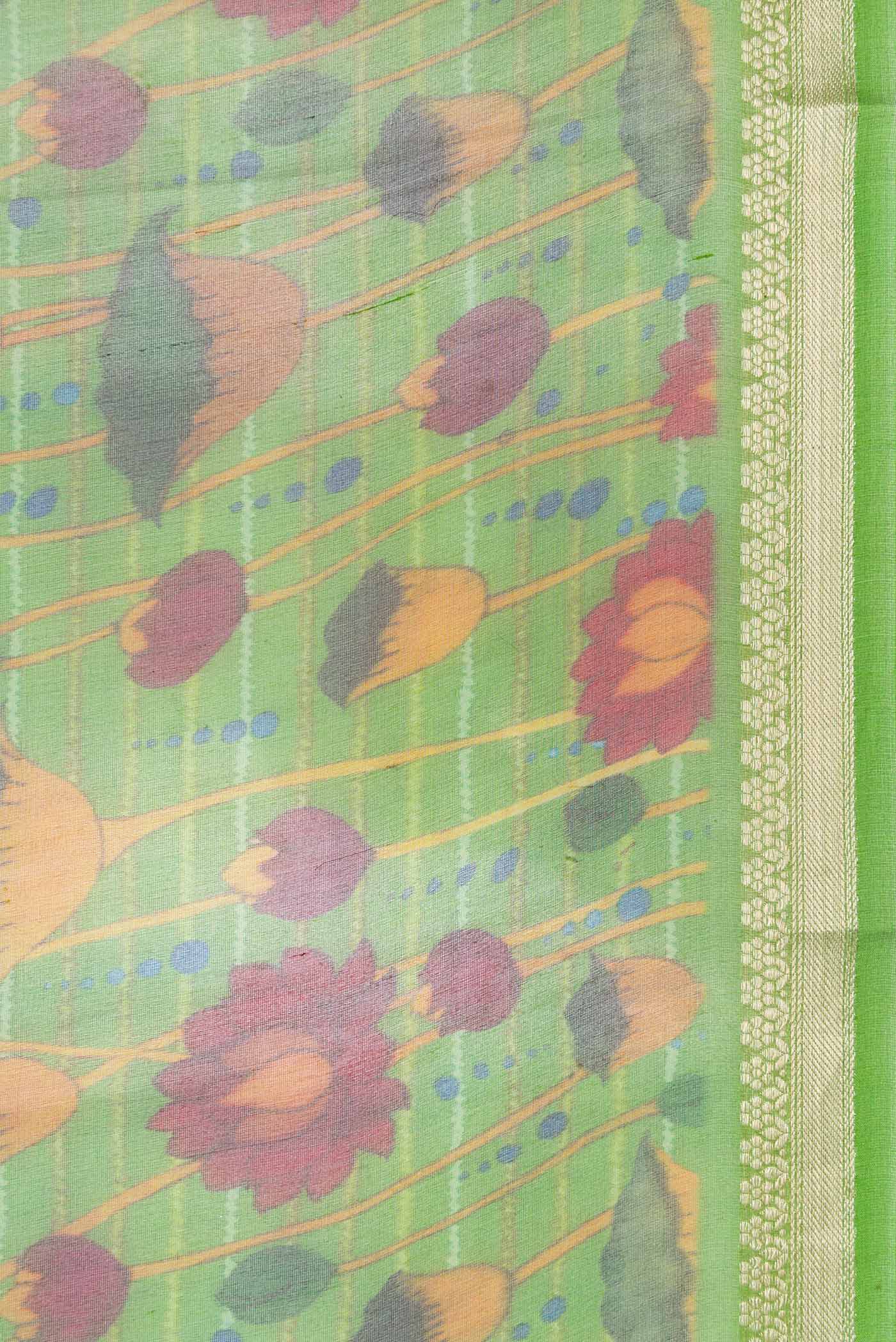 Border image of Green Dual Tone Organza Silk Saree with Printed design on the body and Zari Border. 