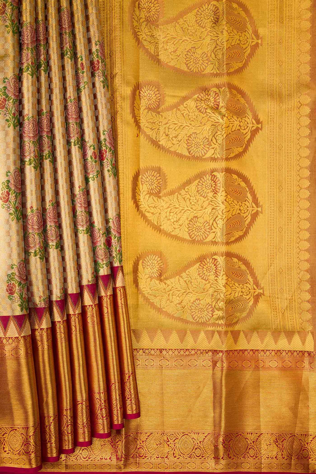 Pleats and pallu of Gold Dual Tone Kanjivaram Tissue Silk Saree with Zari Brocade on the body and Zari Border. 