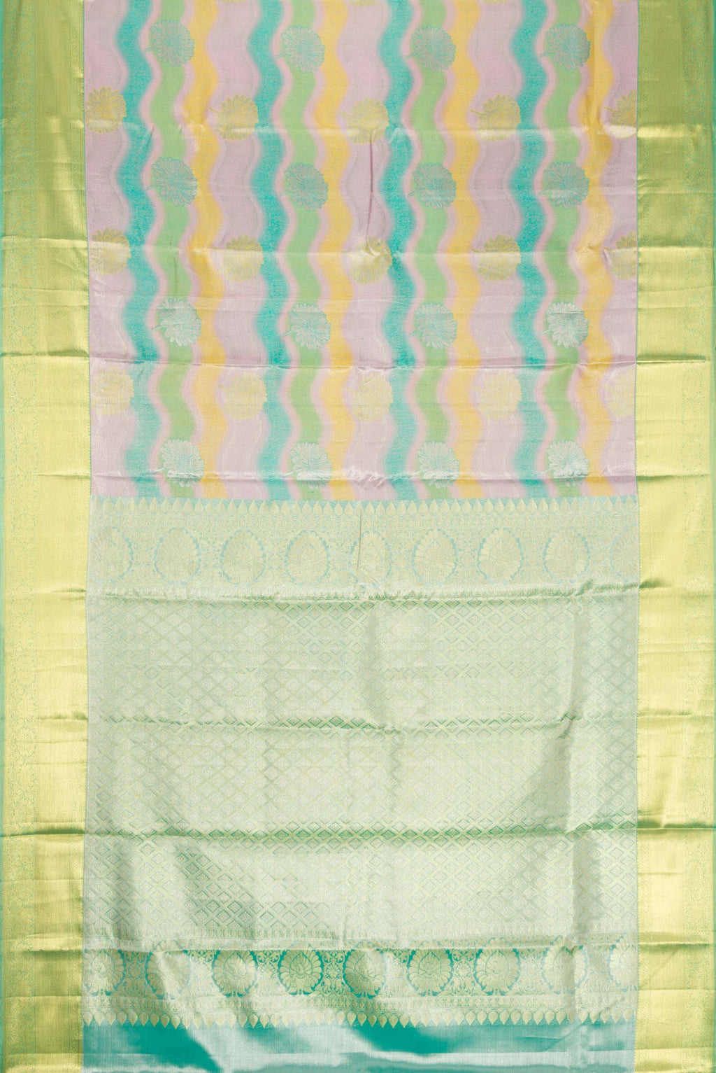 Flat view of Green and Lavender Color Kanjivaram Tissue Silk Saree with Zari Brocade on the body and Zari Border. 