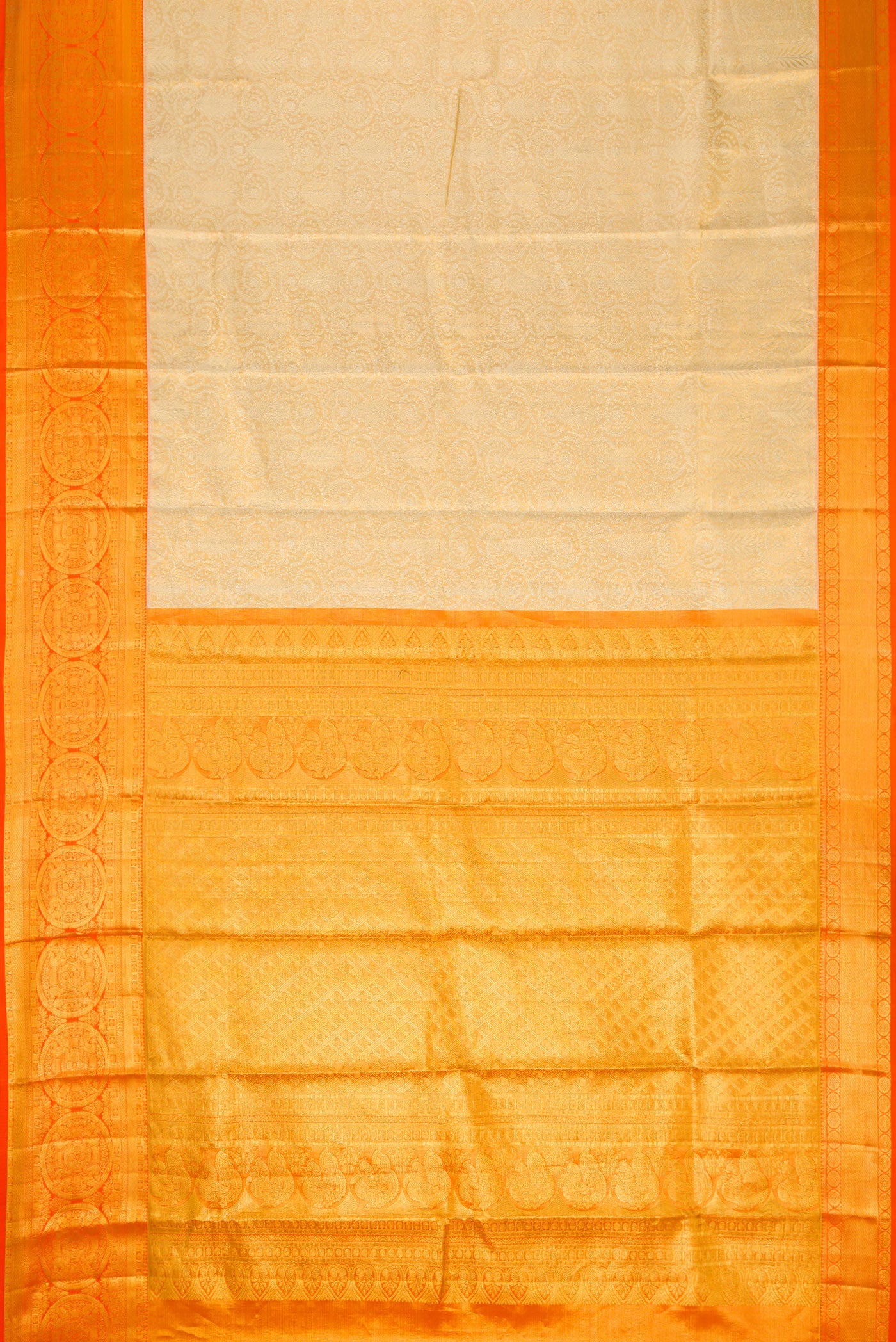 Flat view of Gold Dual Tone Kanjivaram Tissue Silk Saree with Zari Brocade on the body and Zari Border. 