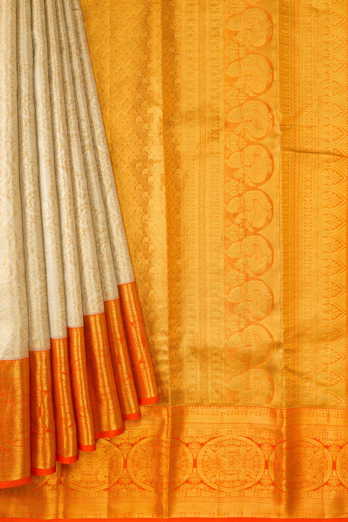 Pleats and pallu of Gold Dual Tone Kanjivaram Tissue Silk Saree with Zari Brocade on the body and Zari Border. 