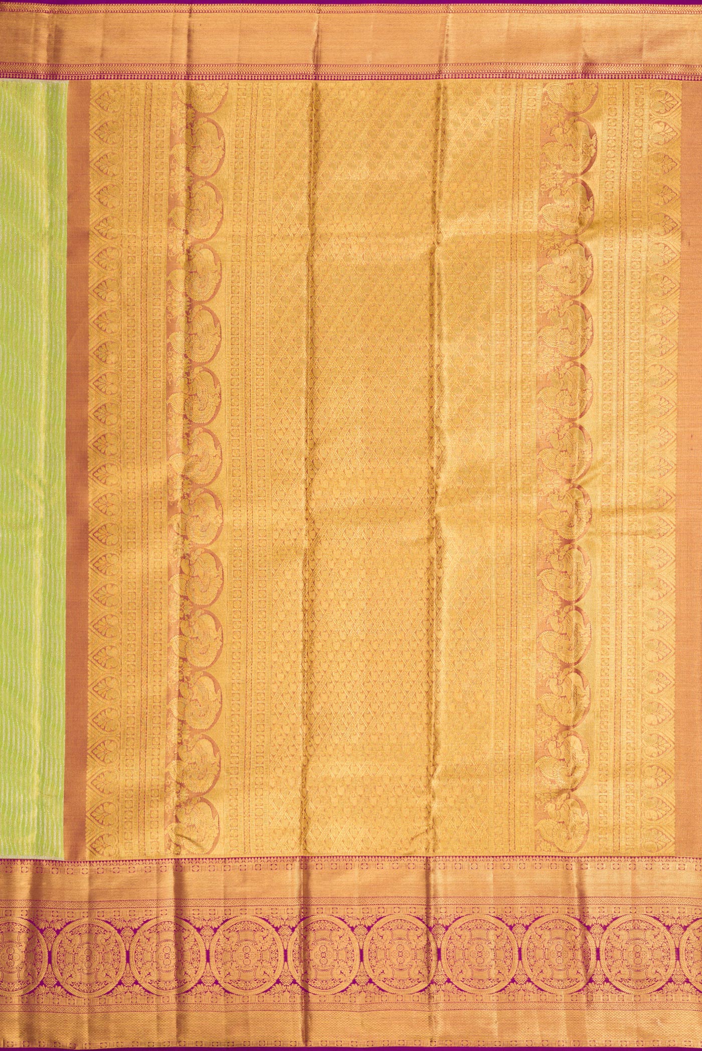 Close up image of the pallu of Parrot Green Dual Tone Kanjivaram Tissue Silk Saree with Zari Brocade on the body and Zari Border. 