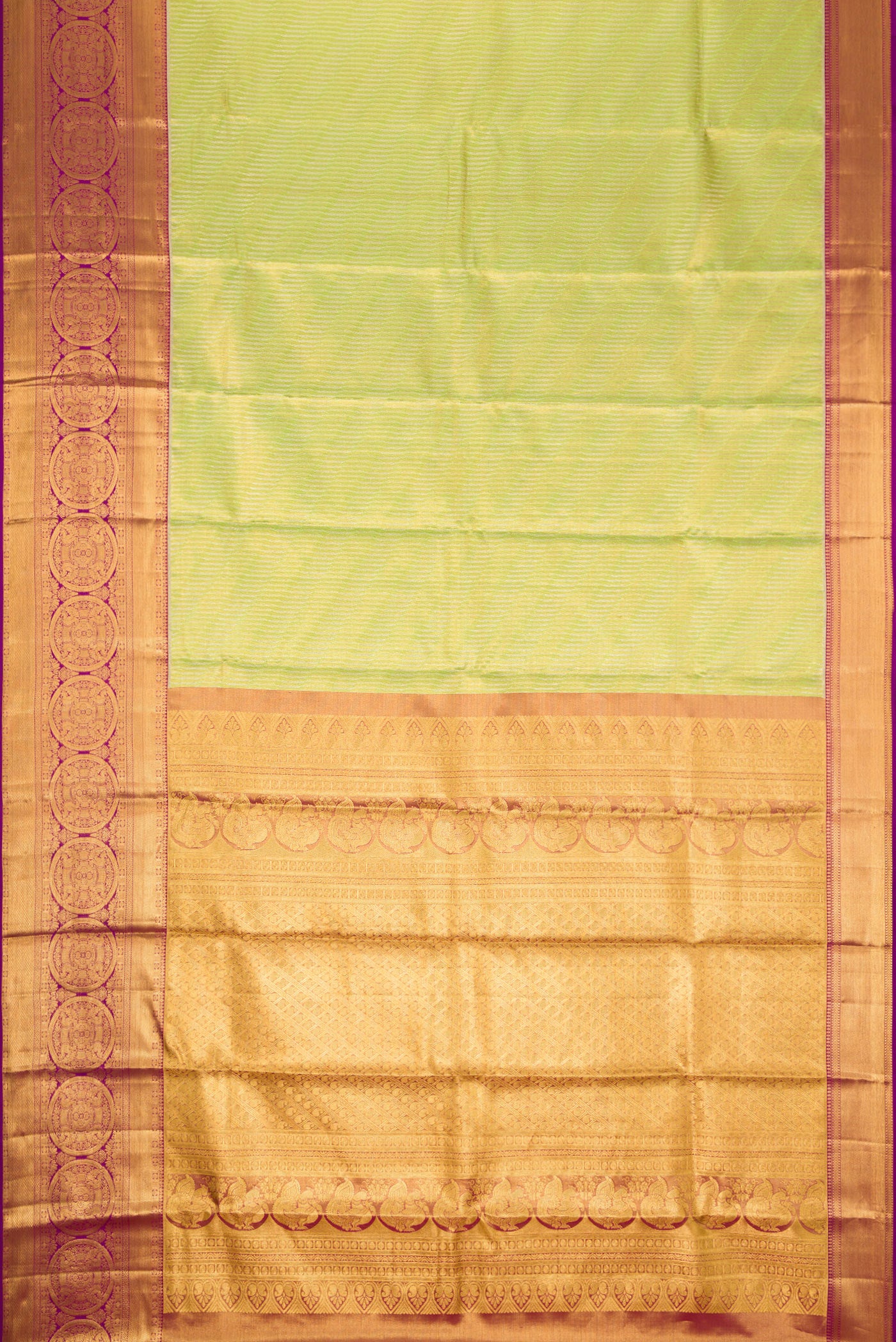 Flat view of Parrot Green Dual Tone Kanjivaram Tissue Silk Saree with Zari Brocade on the body and Zari Border. 