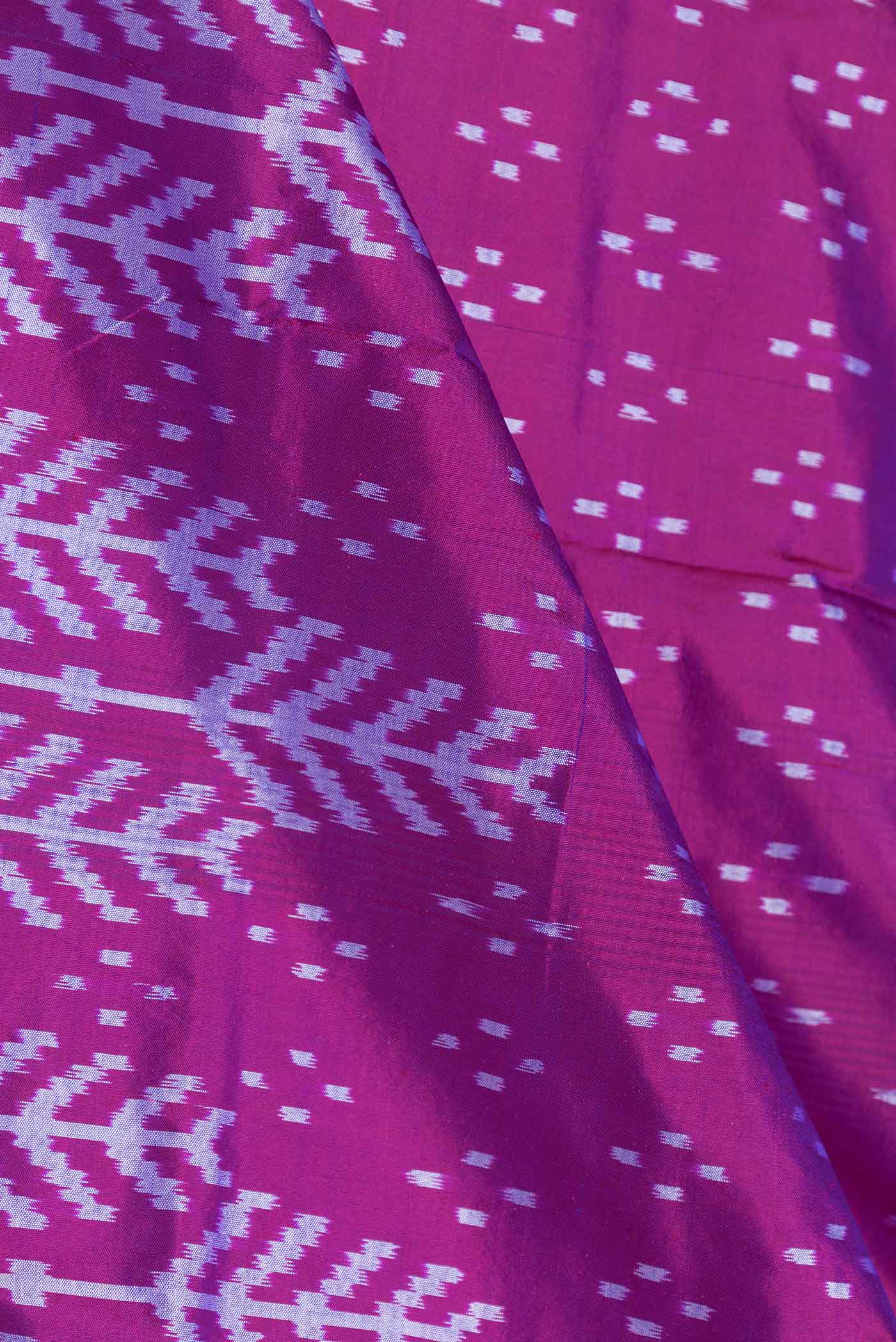 Close up of Purple Pochampally Silk Saree with Pure Ikat on the body and Zari Border displaying folds