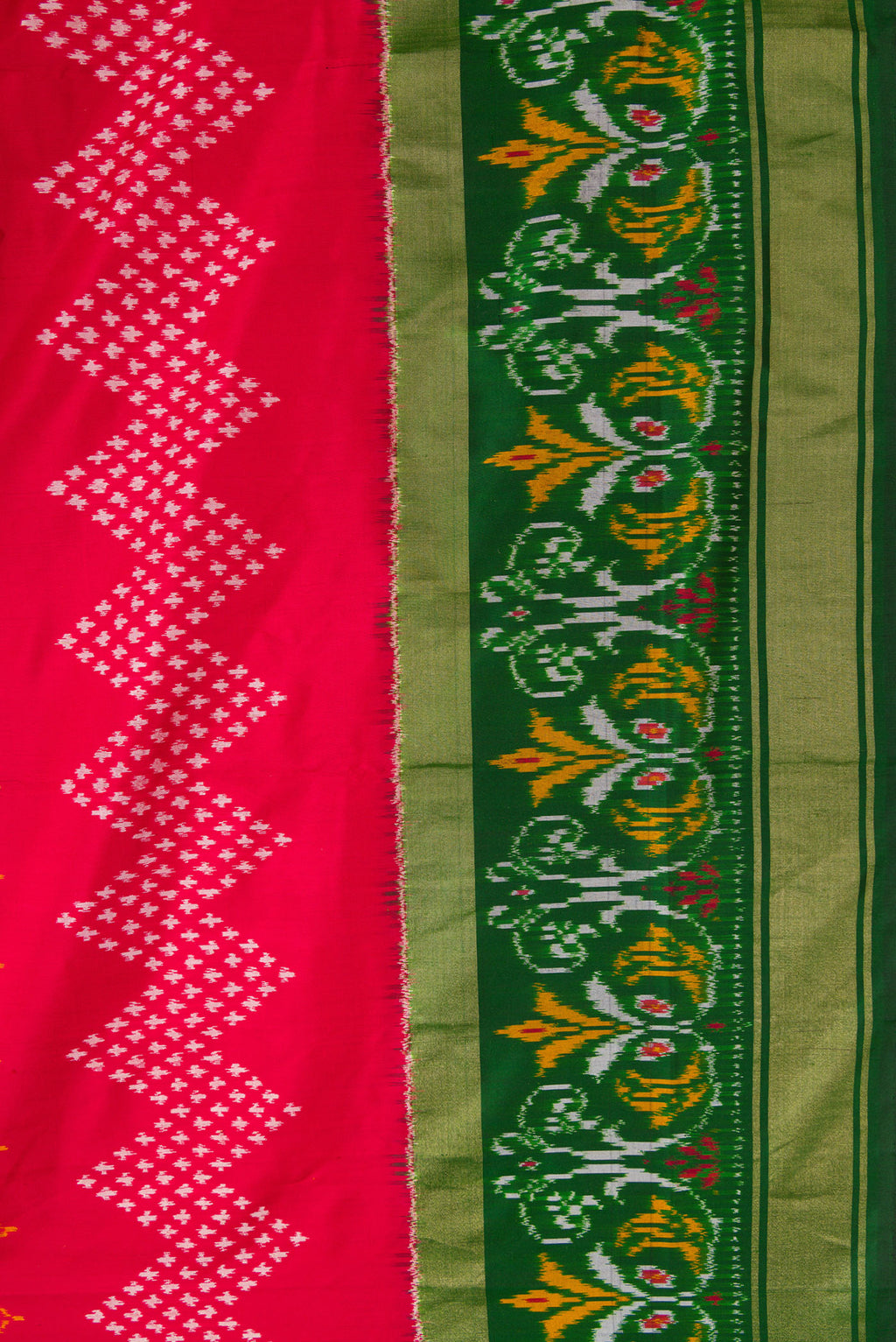 Border image of Red Dual Tone Double Ikat Saree with Ikat Print on the body and Ikat Border. 