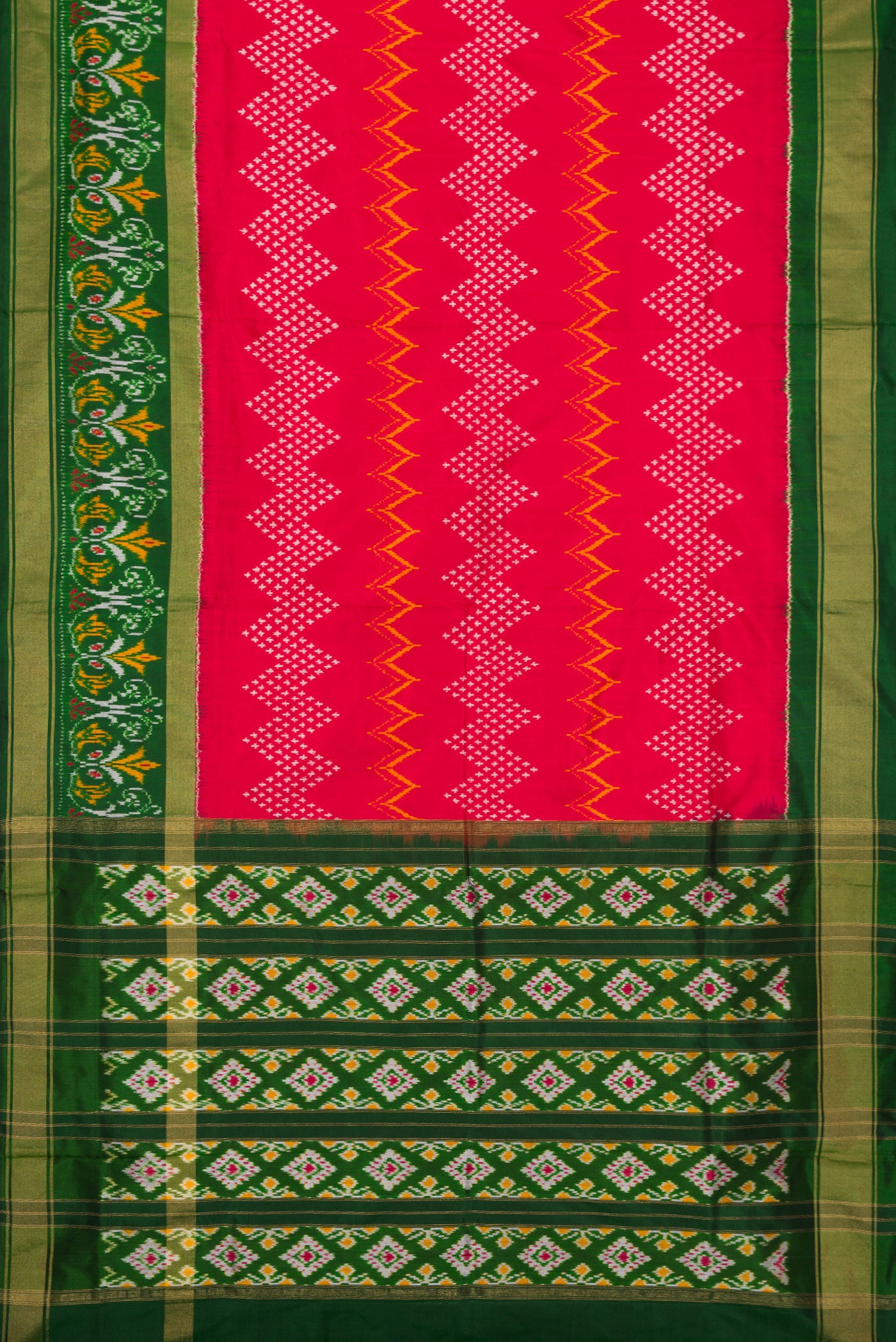 Flat view of Red Dual Tone Double Ikat Saree with Ikat Print on the body and Ikat Border. 