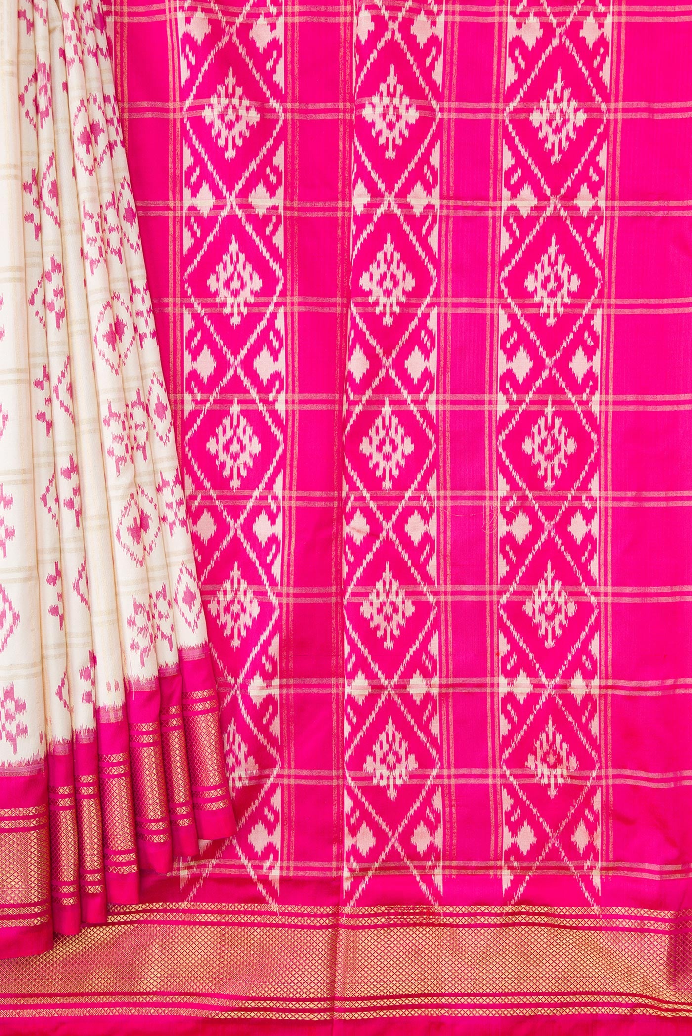 Pleats and pallu of Off White Dual Tone Double Ikat Saree with Ikat Print on the body and Zari Border. 