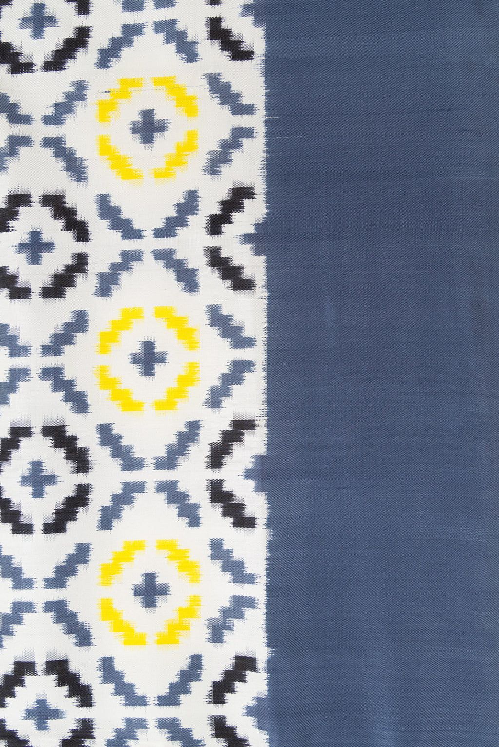 Border image of Off White Dual Tone Double Ikat Saree with Ikat Print on the body and Plain Border. 