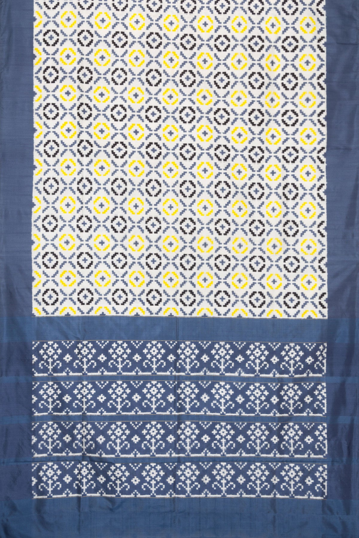 Flat view of Off White Dual Tone Double Ikat Saree with Ikat Print on the body and Plain Border. 