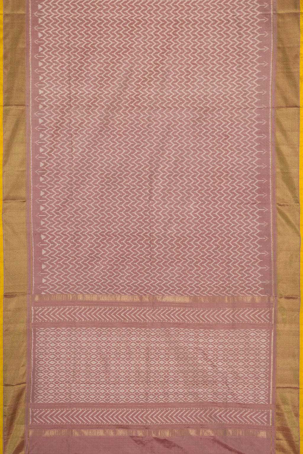 Flat view of Brown Dual Tone Double Ikat Saree with Ikat Print on the body and Zari Border. 