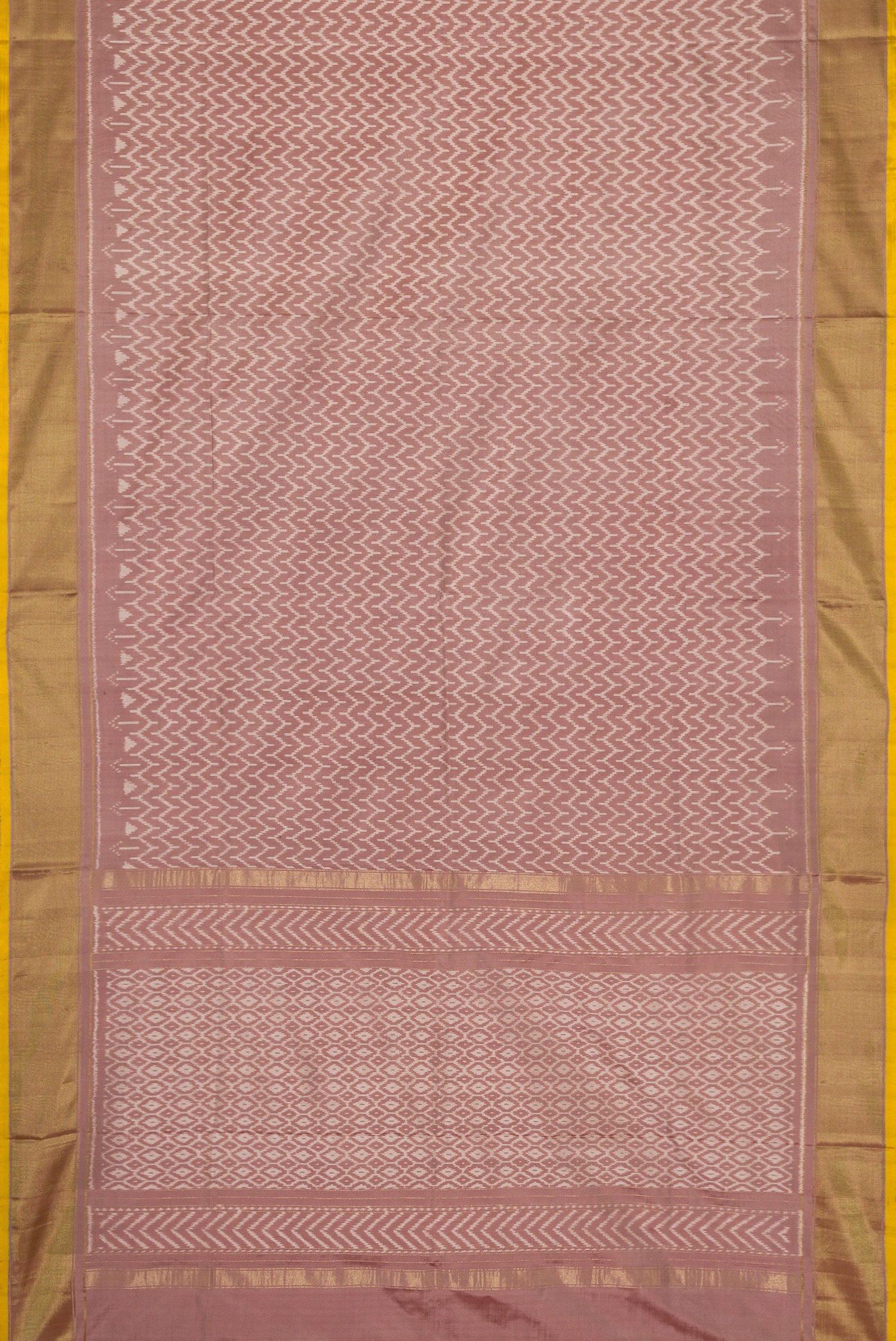 Flat view of Brown Dual Tone Double Ikat Saree with Ikat Print on the body and Zari Border. 