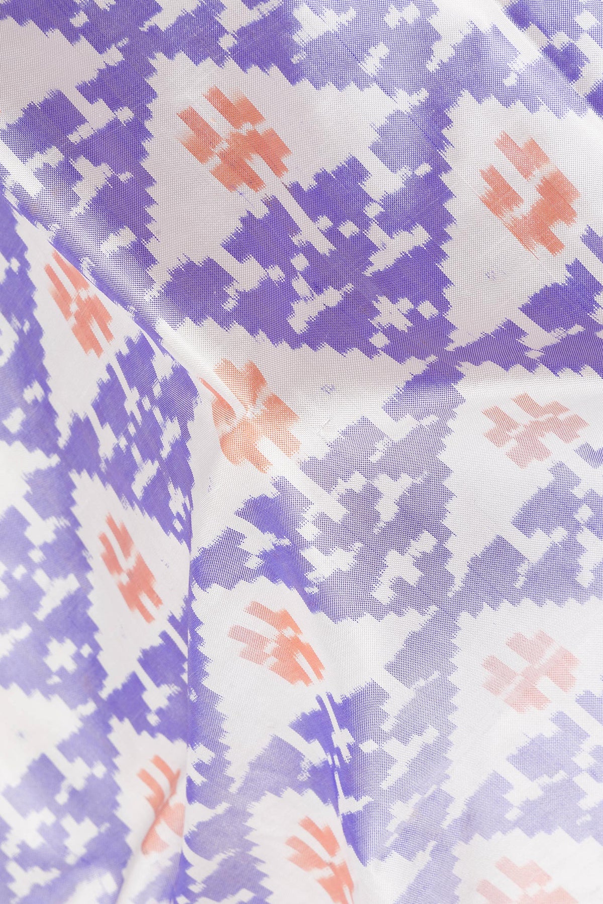 Close up of Pure Silk Off White Pochampally Saree with Pure Ikat on the body and Plain Border.  displaying folds