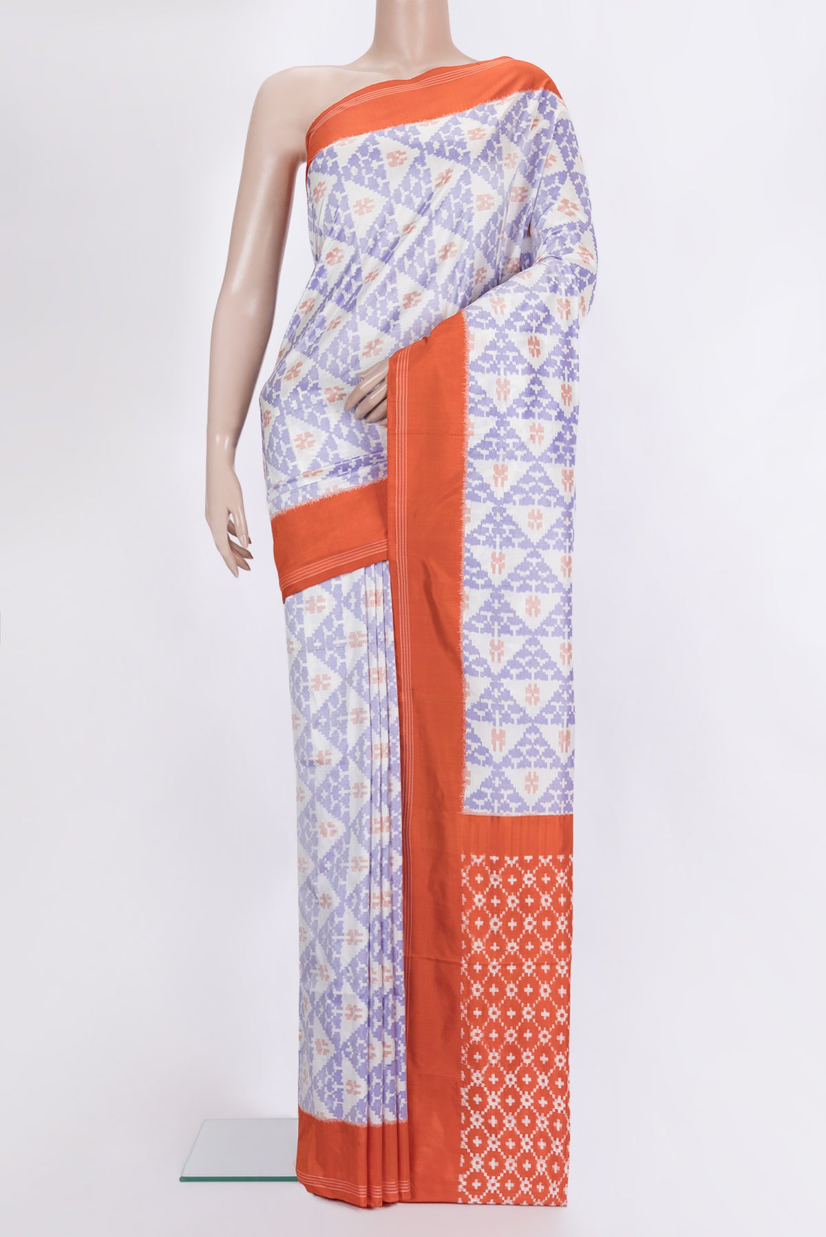 Pure Silk Off White Pochampally Saree with Pure Ikat on the body and Plain Border.  displayed on a mannequin