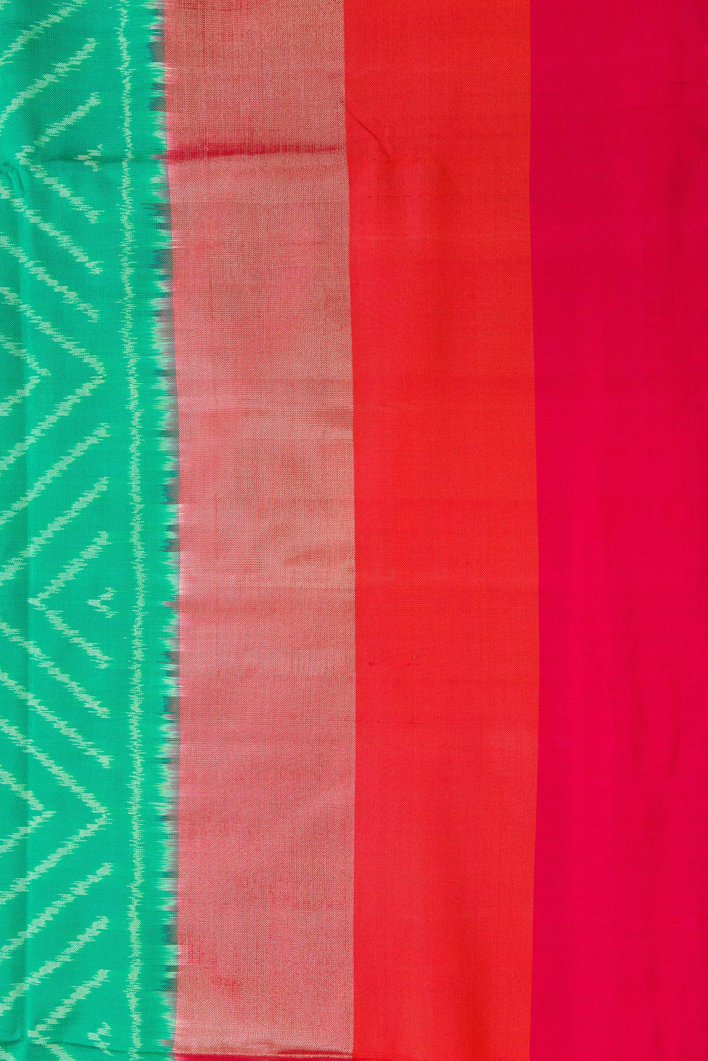 Border image of Sea Green Dual Tone Double Ikat Saree with Ikat Print on the body and Zari Border. 