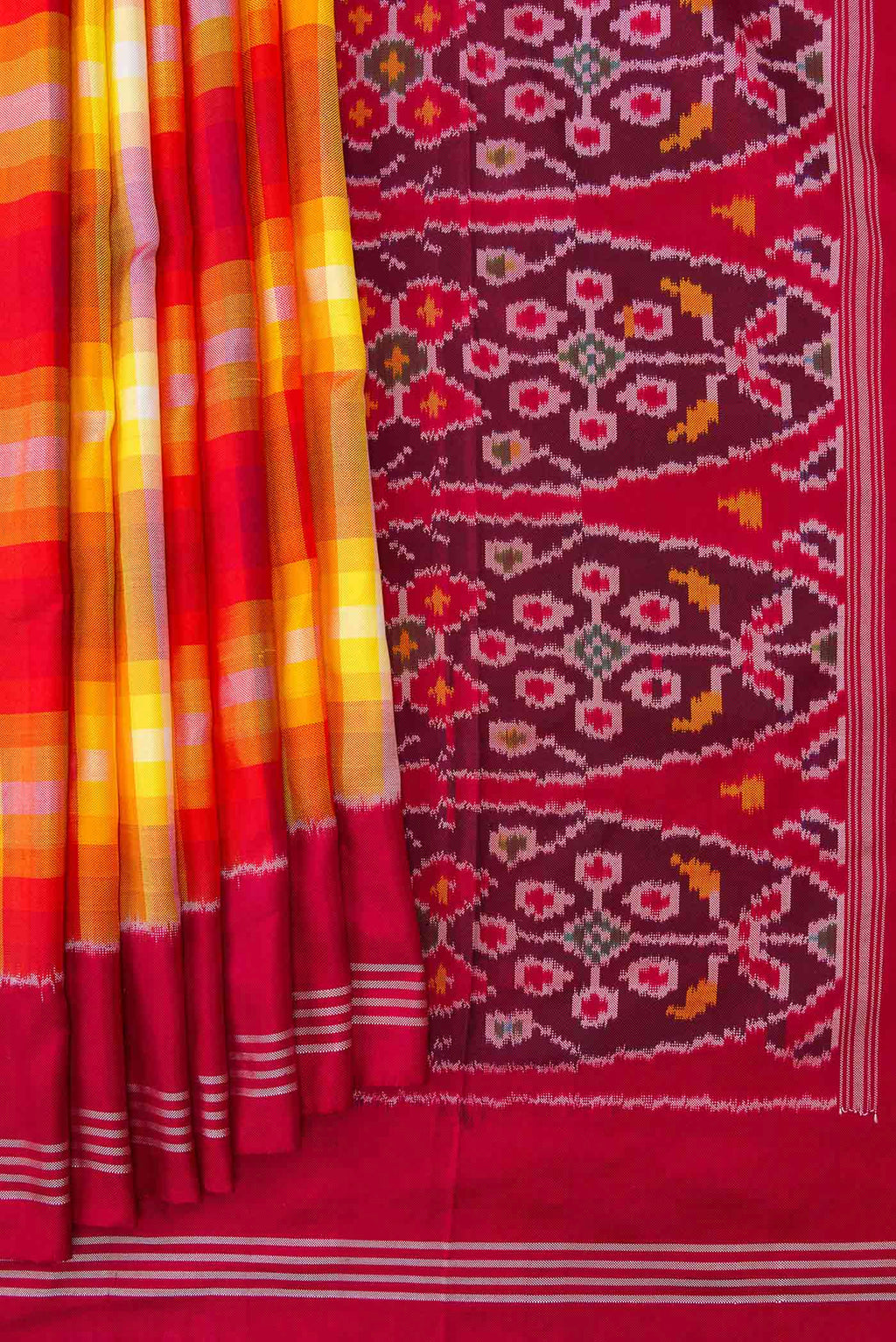 Pleats and pallu of Mustard Dual Tone Double Ikat Saree with Checked design on the body and Zari Border. 