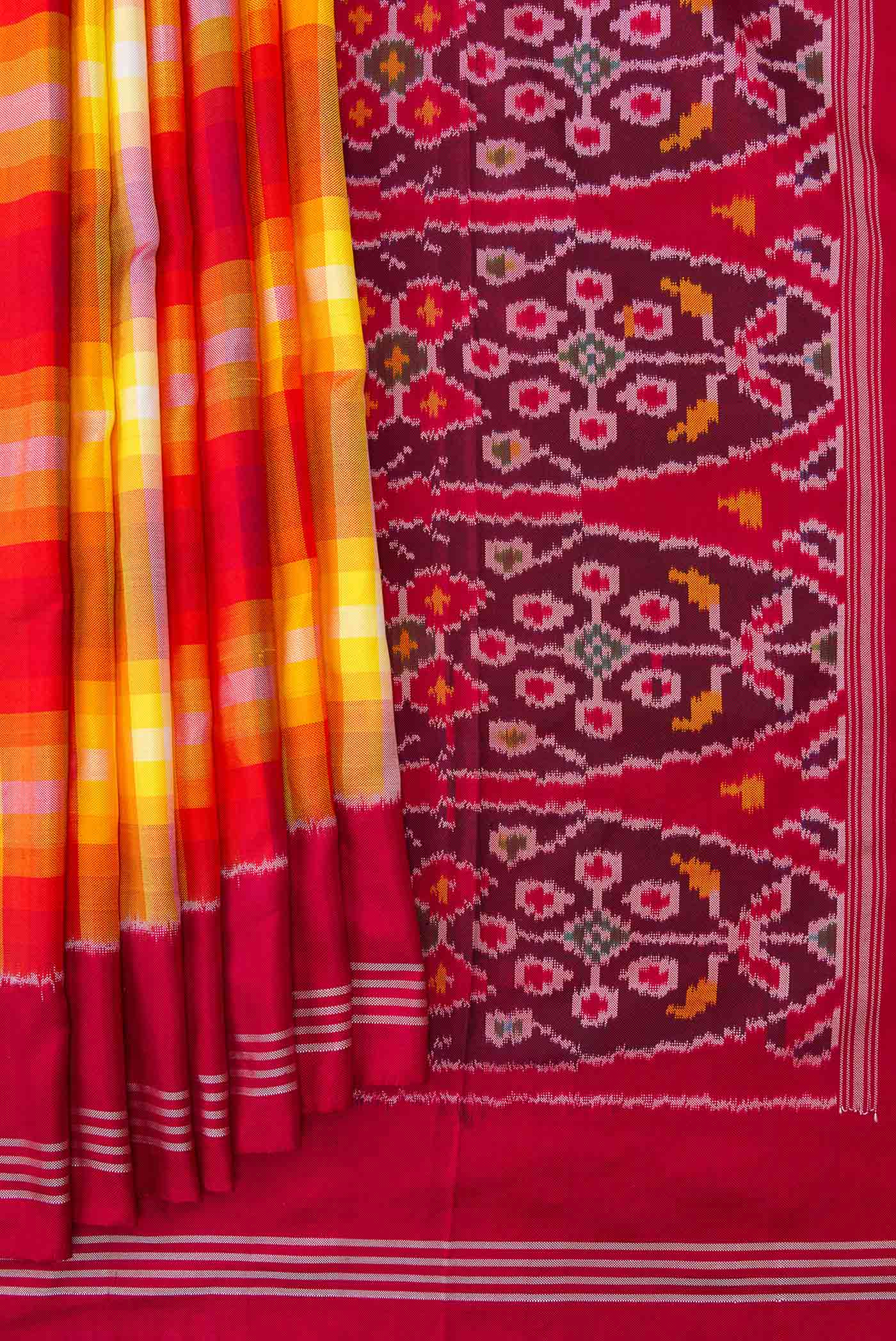 Pleats and pallu of Mustard Dual Tone Double Ikat Saree with Checked design on the body and Zari Border. 