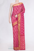Pink Dual Tone Double Ikat Saree with Ikat Print on the body and Zari Border.  displayed on a mannequin