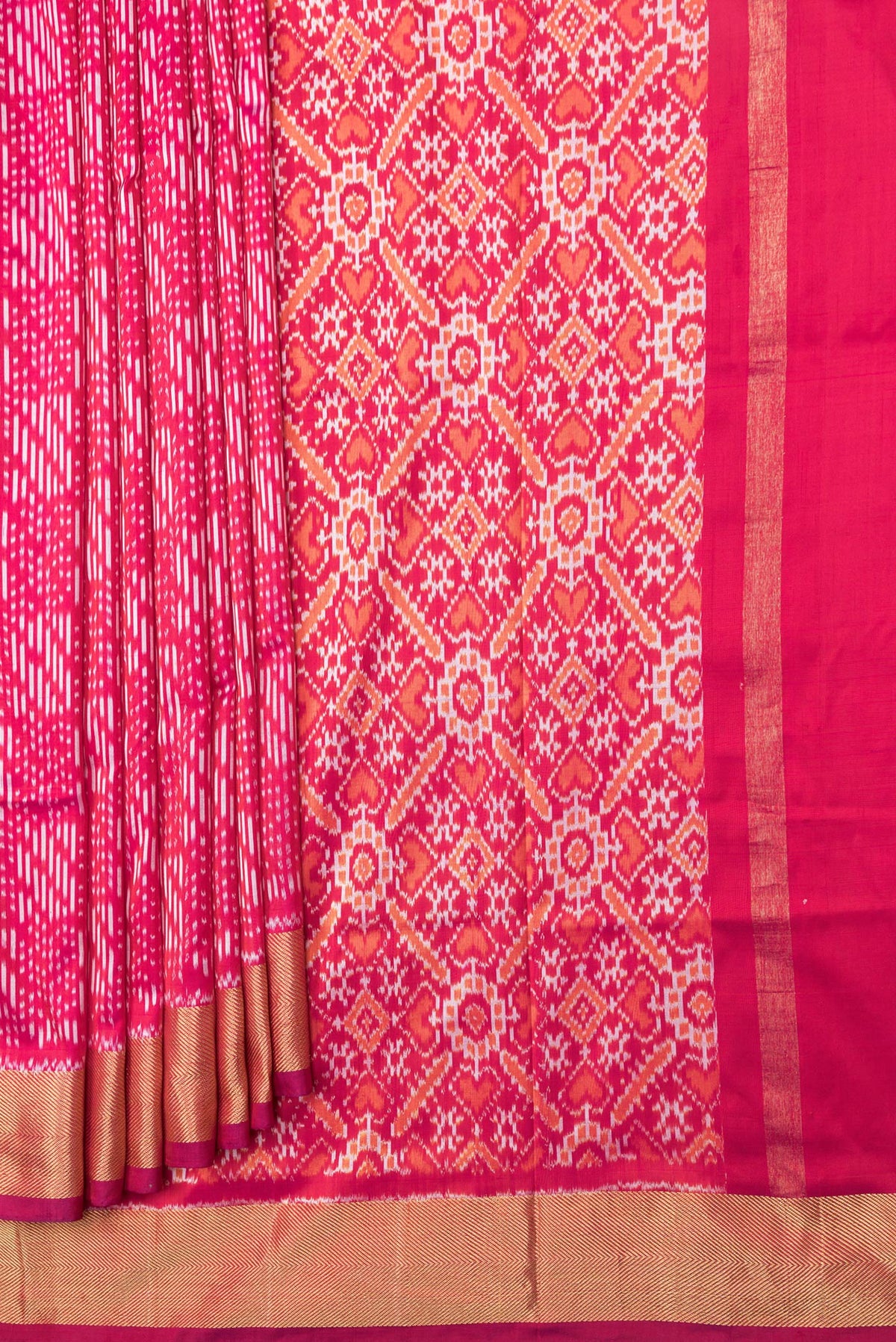 Pleats and pallu of Pink Dual Tone Double Ikat Saree with Ikat Print on the body and Zari Border. 