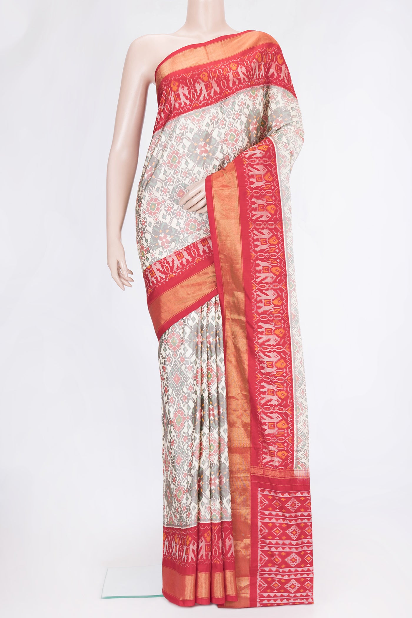Grey Dual Tone Double Ikat Saree with Ikat Print on the body and Ikat Border.  displayed on a mannequin