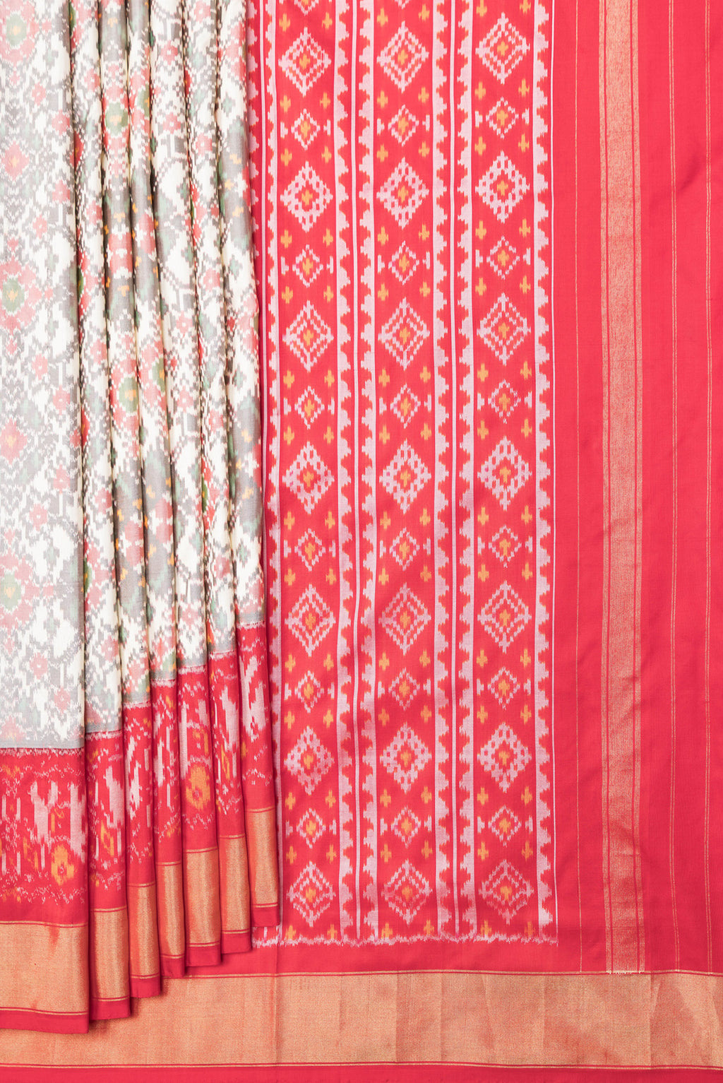 Pleats and pallu of Grey Dual Tone Double Ikat Saree with Ikat Print on the body and Ikat Border. 