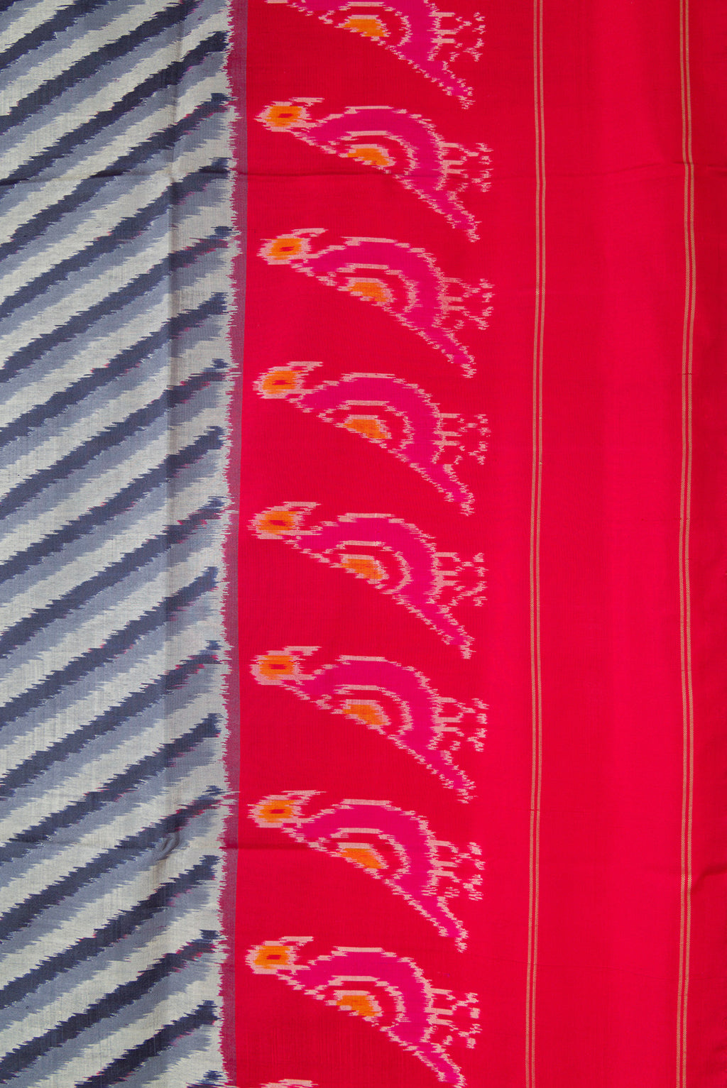 Border image of Grey Dual Tone Double Ikat Saree with Ikat Print on the body and Ikat Border. 
