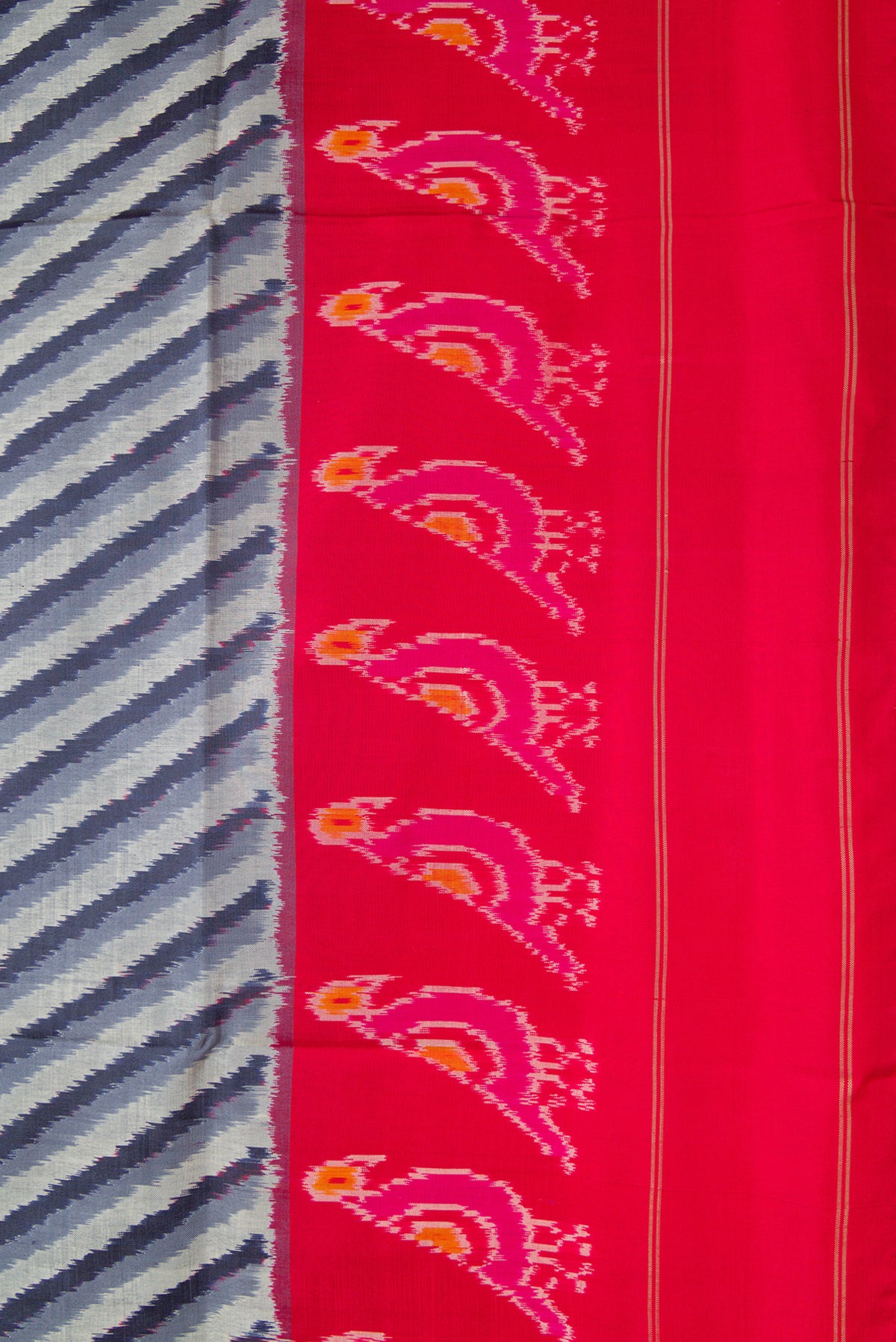Border image of Grey Dual Tone Double Ikat Saree with Ikat Print on the body and Ikat Border. 