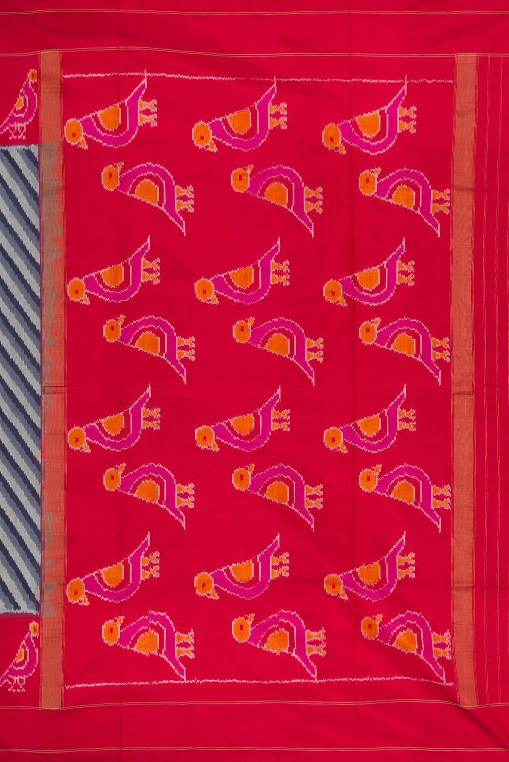 Close up image of the pallu of Grey Dual Tone Double Ikat Saree with Ikat Print on the body and Ikat Border. 