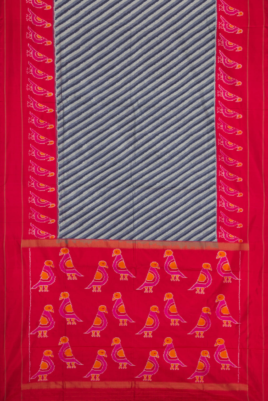 Flat view of Grey Dual Tone Double Ikat Saree with Ikat Print on the body and Ikat Border. 