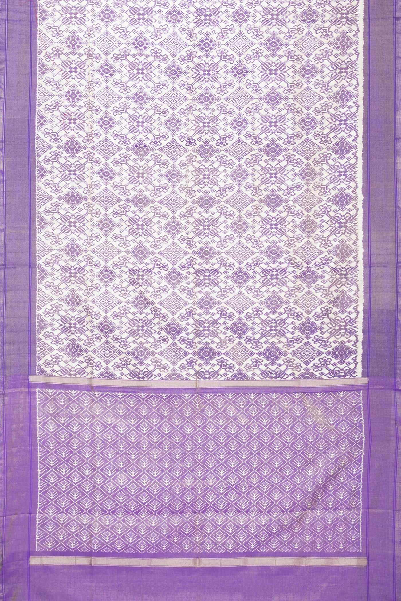 Flat view of Off White Dual Tone Double Ikat Saree with Ikat Print on the body and Ikat Border. 
