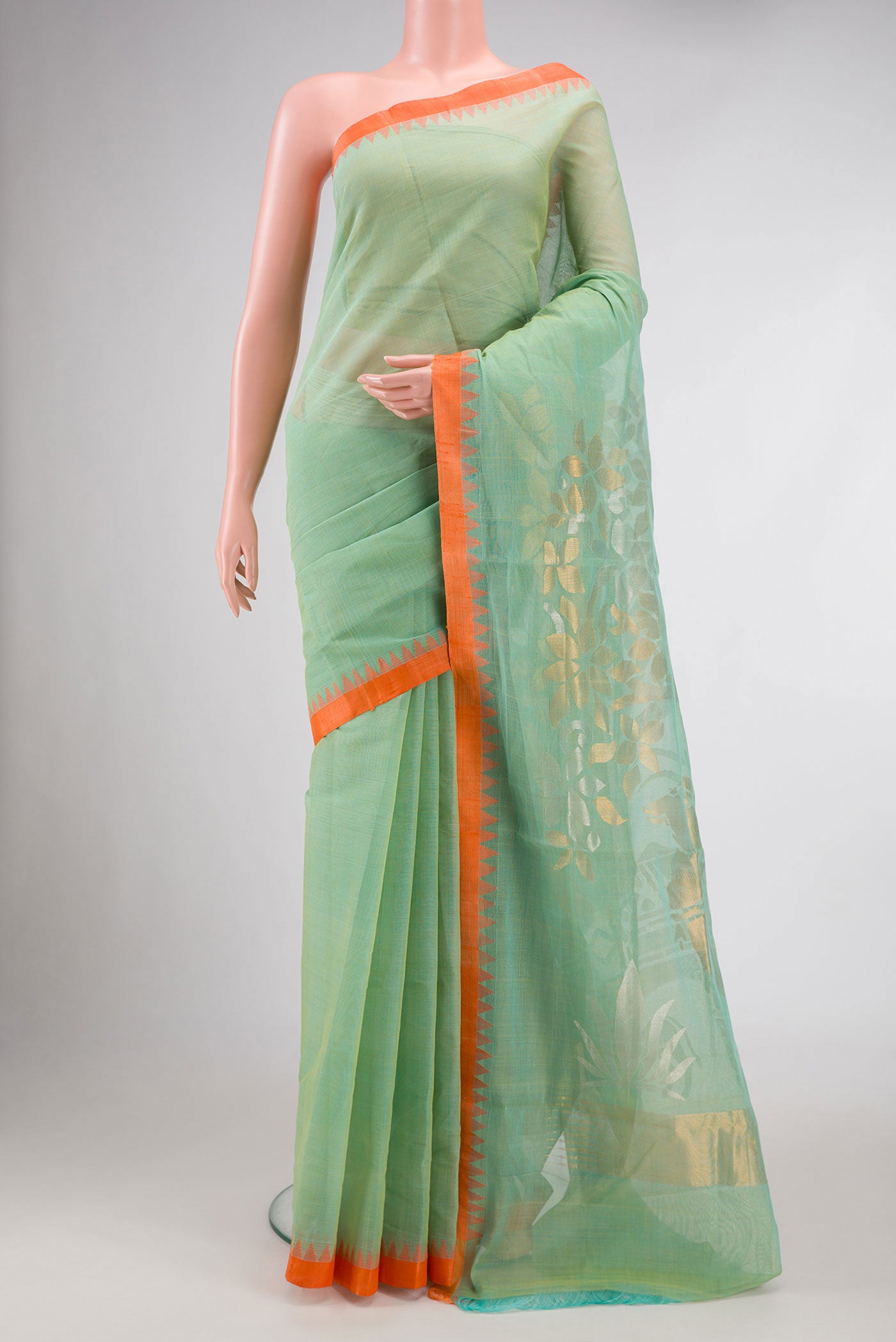 Pista Green Dual Tone Uppada Silk Saree with Plain Body and Thread Border.  displayed on a mannequin