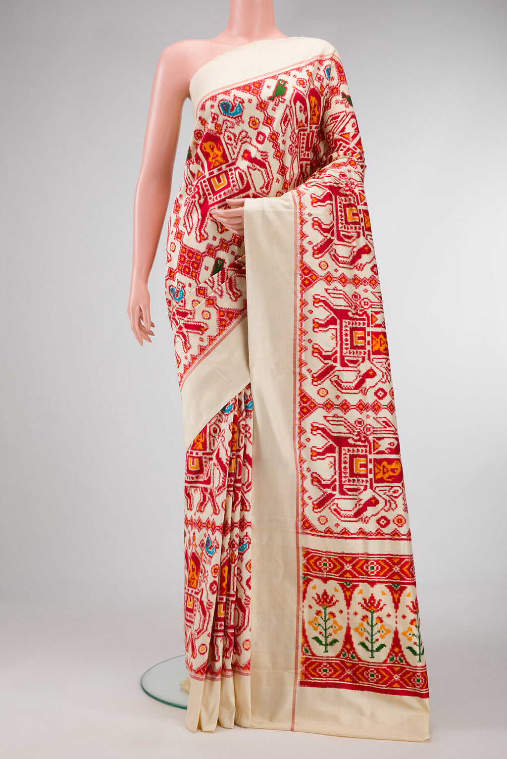 Sandal Dual Tone Double Ikat Saree with Ikat Print on the body and Plain Border.  displayed on a mannequin